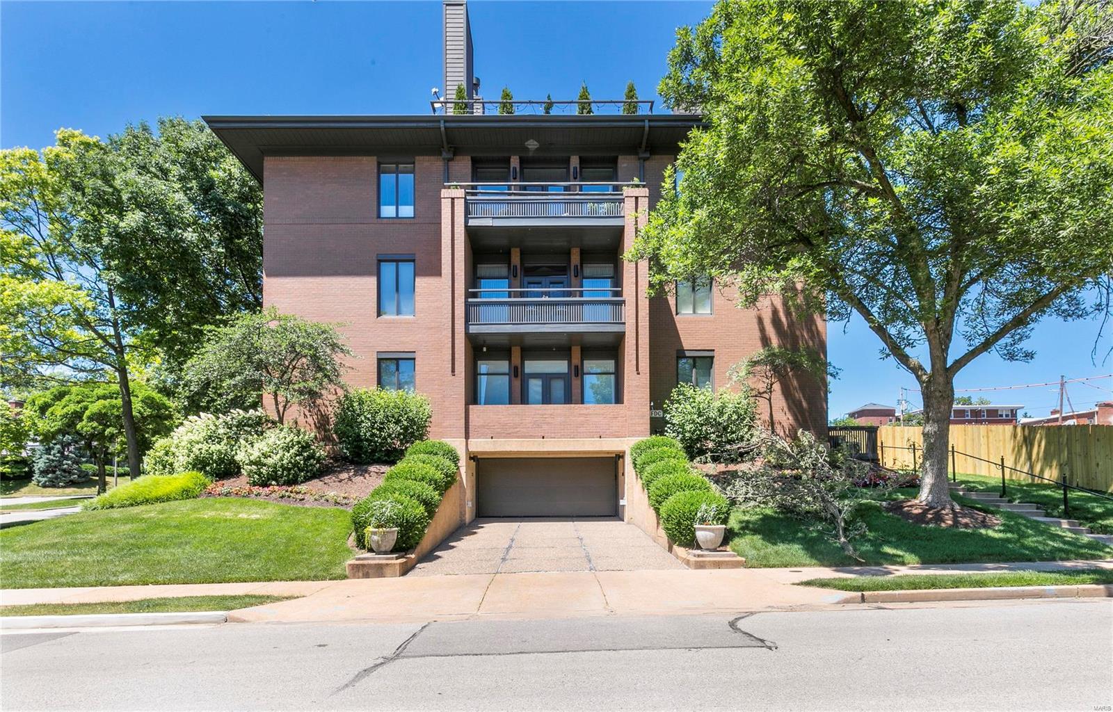Fantastic New Price! Curated urban design provides the perfect backdrop for sophisticated living in the heart of Clayton! Remodeled from top to bottom, the home features state-of-the-art kitchen and bathrooms, built-in sound system throughout, two gas fireplaces, two terraces and new mechanical/electrical/plumbing.  Classic, inspiring space was created by opening the entertaining areas, allowing the rooms to spread out among the ten-foot ceilings and walls of windows…appointed with vogue accents throughout and resting in an effortless location! Location: Corner Location, Downtown, End Unit, Ground Level