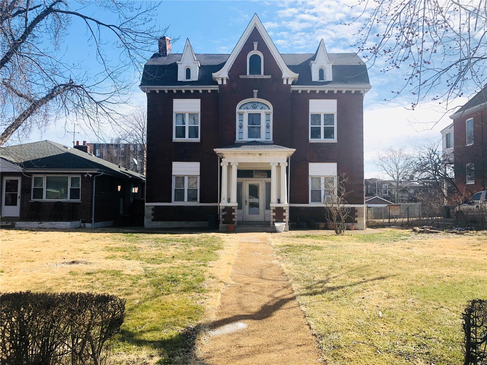 This architecturally appealing, fully occupied, 4-family features 2,928 sq ft and was built in 1902. Longterm tenants (1 as long as 35 years) would love to stay and are open to signing 2-5 year lease terms. The common space has a beautiful staircase that leads up to 3 levels and down to the basement area. The first floor units offer 3 large rooms; living, walk through bedroom, eat-in kitchens, and access to the back deck/fenced in yard. 1 upper level unit has 5 rooms; living, dining (currently being used as a walk-through bedroom), eat-in kitchen, bedroom, and enclosed deck. The other upper level unit has 4 rooms; living, eat-in kitchen, back bedroom, and an enclosed deck. The 3rd level is unfinished with potential to add a studio apartment or act as storage. The basement houses the tenant owned laundry machines and has a side walk out. The property is 1/2 block from the Dutchtown Commercial District & in the Dutchtown Community Improvement District. This is an as-is sale.