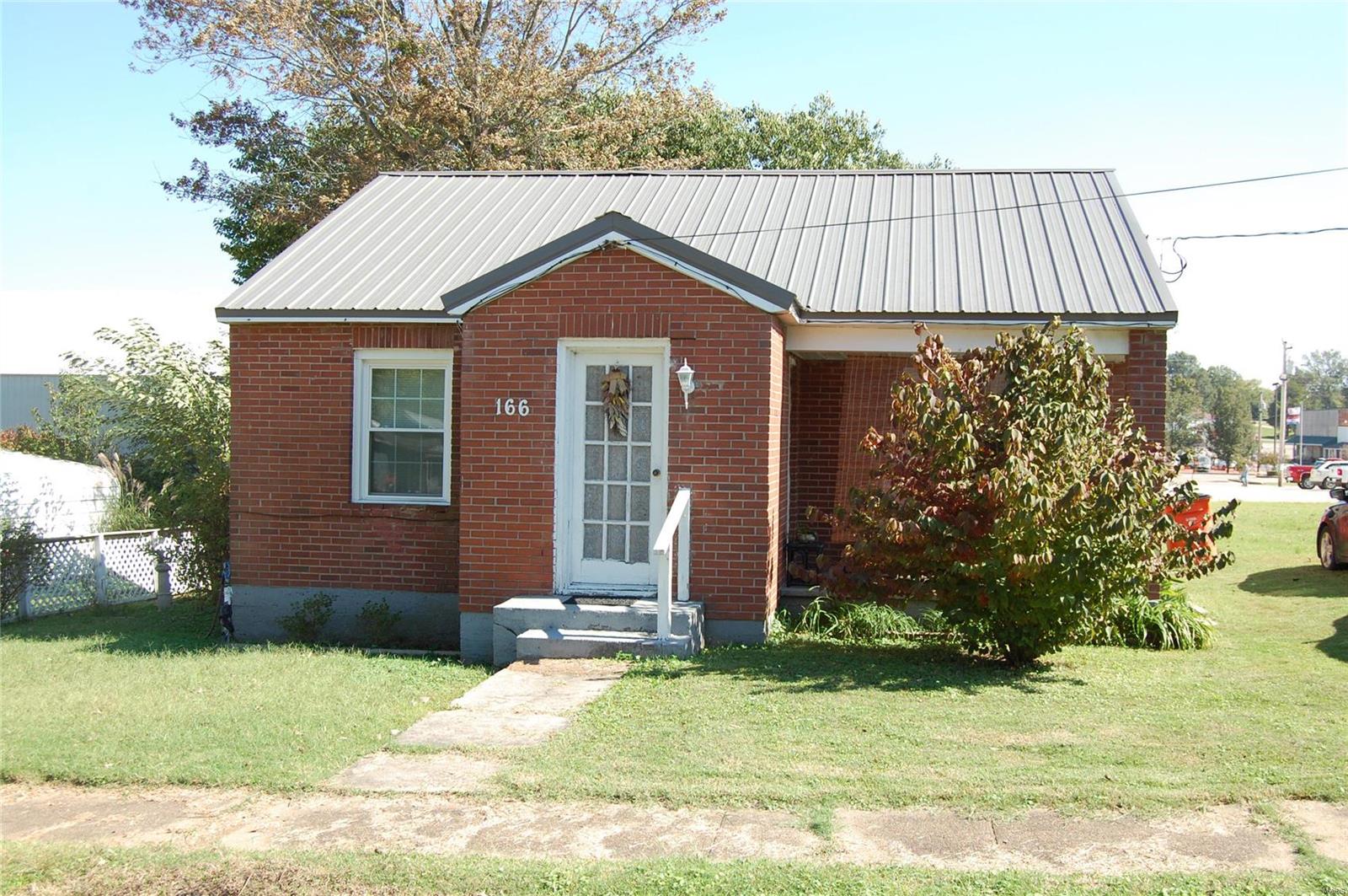 Cozy, 1 bedroom, 1 bath brick cottage in Puxico. Metal roof, vinyl tilt out windows, Tankess hot water heater, ventless gas fireplace. Privacy fenced backyard oasis-super cute.