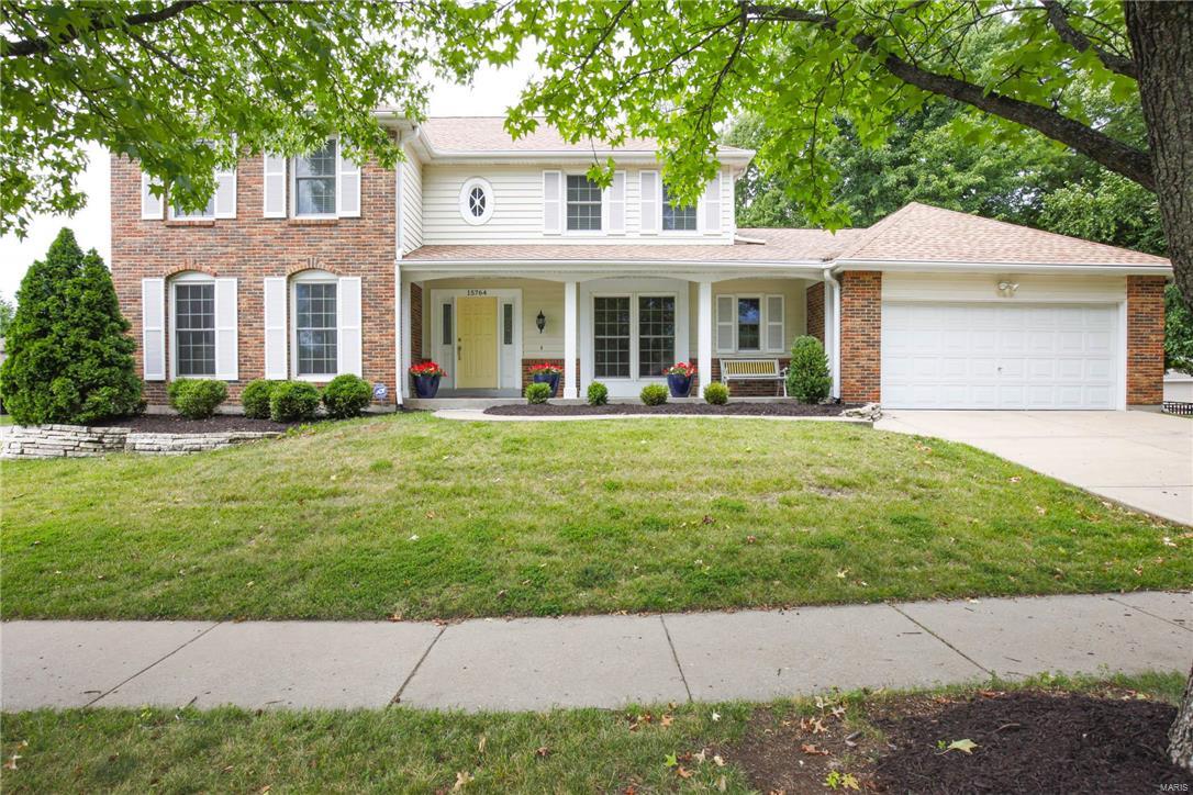 Beautiful curb appeal is merely the beginning of this welcoming UPDATED home on a fantastic fenced level lot in The Villages at Baxter Ridge. Enter into your move-in ready home featuring; 2 story foyer, neutral decor, crown molding/custom millwork, gleaming hardwood floors, pella windows, full masonry WB fireplace and desired open living room. Gorgeous center island kitchen, granite countertops, soft close cabinetry, ss appliances & picture window overlooking the beautiful backyard. Spacious laundry w terrific built-in storage! Roomy master bedroom features walk-in closet, bath w double sinks & sep tub/shower. Three additional bedrooms & full bath complete upper level. Pleasant outdoors w mature trees, gutter guards, oversized downspouts, and an abundance of patio space! Bonus retreat 1 tenth a mile from home to Pool, Tennis Courts, Clubhouse featuring game room & full kitchen! Attractive location, easy access to Hwy 40 as well as Chesterfield Valley shopping & restaurants.