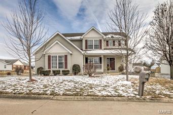 COME SEE THIS BEAUTY!! This 3 bedroom/2 full and 2 half bath house is a must see in the Huntington Acres neighborhood. The house sits on a a corner lot with over a quarter acre of land. Immediately you will notice the unique design of this fantastic property. The house boast a nice covered front porch for your morning coffee and a large back deck for those family BBQs. As you wonder through this house you will start with a large entry foyer, walk past a nice formal dinning room in to a great room with soaring cathedral ceilings and hardwood floors. The living room also has a Buck wood-insert designed to heat 1,800 sq.ft. You will enjoy a large, updated kitchen and main floor laundry. Upstairs has a Luxury Master Suite, Large soaking tub, separate shower, double bowl vanity and walk-in closest. The fully finished lower level, including a bar and half-bath will be perfect for entertaining. Added bonus is this home is all electric so no gas bill.