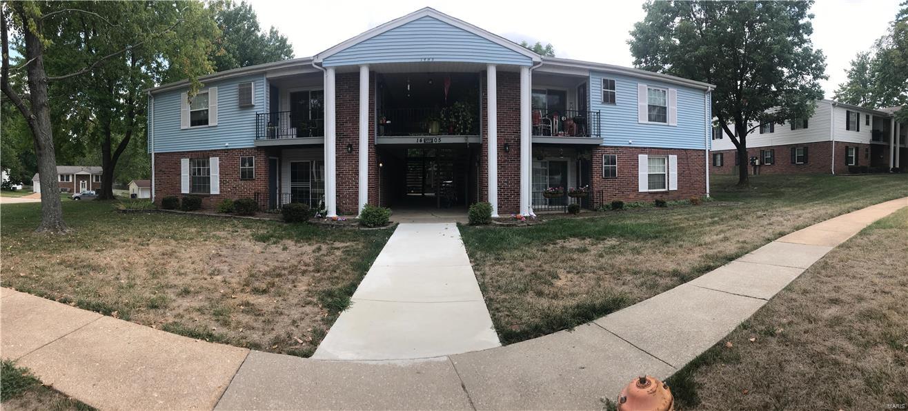 Main level 2 bedroom/1 bath condo with low fees.  Freshly painted throughout, wood floors in living area, six-panel doors.  This condo is ground floor and the laundry facilities are right outside  the front door (no stairs and covered).  The bath is updated and has a shower with low step and built-in seat and rails. Some Accessible Features Location: Ground Level