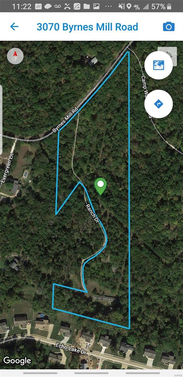 Private & Very Beautiful 10+ Acres.  This is located of county road starts wooded to some cleared land at back of property.  Land  has electric poles that do go through the property.  Total of 2 electric poles & a well on site.  At the roads bend there is an older home that is a tear down. (DO NOT TRY TO ENTER IT).   Going on through the home there is an 1800 sq ft concrete & cinder block out building that will need a new roof, but owner says structure in good shape. That would make great Stalls for Horses.   This land has so much potential.  Please note the road is a rough cut-in but clear to drive through so note...enter at your own risk.  Please do not enter buildings unless accompanied with owner. Selling as-is. ~ Call Listing Agent for your appointment today!
