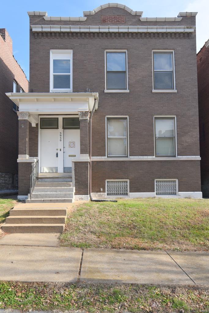 Excellent investment or owner occupant property. Rehabbed right-Updated wiring, plumbing, roof completely replaced in 2015 along with 2 AC compressors under cages. Two large apartments that have been renting for $1,600/month ($850 + $ 750). 1st floor has 2 bedrooms and the 2nd floor has 3. Around 1,000 square feet per apartment huge rooms.

The 2nd floor apartment has just been painted. 2nd floor is vacant. The first floor has been occupied by the same tenant since July 2016. The basement has storage areas for tenants use, a 2 car garage is off the alley.