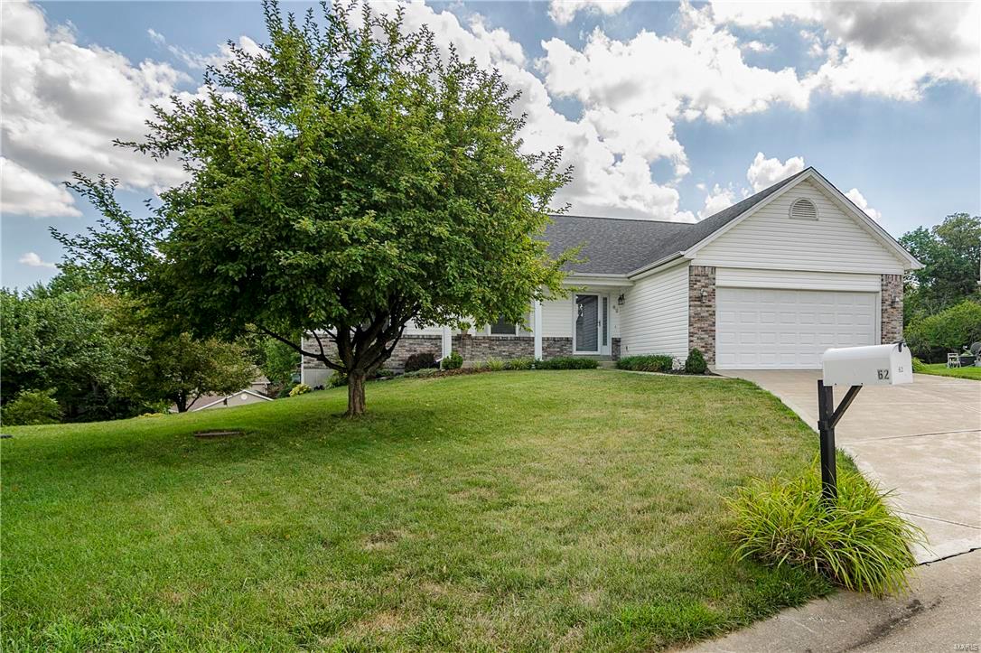 Wait until you see the back yard!! Original owners paid a $13,000 premium for this cul-de-sac, walk-out, level yard! Huge open ground and backs to mature trees and common ground!! Open concept, vaulted ceilings and newer carpeting thru-out: Entry foyer flows into Great Room w/ceiling fans (lots of wall space for family furniture) & opens to Dining & Kitchen: Master Suite w/full shower & soaking tub + vaulted ceiling: Basement is unfinished but, used as Rec Room w/full window & sliding double door to private back yard (rough in plumbing for bath & multi outlets & quiet switches): Six panel doors; Main Floor Laundry: Large deck w/vinyl railings & wide steps; Oversized 2 car garage w/work bench: Beautifully landscaped! 2-10 Premium Home Warranty; Washer, Dryer, Kitchen frig. 'as-is'.