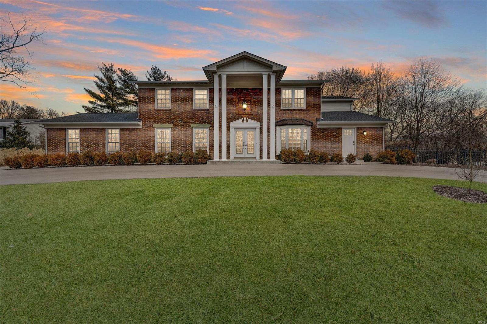 Handsome completely updated 2 Story in Ladue with a spectacular open floor plan! Large entry foyer opens to a light & airy formal living and dining room. Stylish dark wood floors throughout the main level. The Chef in your family will absolutely love this kitchen - all stainless appliances including oversize built-in double-door refrigerator, double oven & cabinets galore. Vaulted ceilings give it an even larger feel, and it is open to family rm w/gas fireplace & vaulted 4-season room with a great view of the in-ground pool. Upstairs is an oversize Master suite - bathroom features large double vanity w/built-ins, separate soaking tub + oversize walk-in shower and custom closet (14x14). 3 generous size bedrooms complete the upstairs. All 4 bathrooms are updated. Main floor laundry with built-in cabinets/pantry. Finished lower LL w/rec room, work-out room full bath (separate tub & shower), possible 5th bdrm & plenty of storage. You will appreciate the completely usable, level back yard. Additional Rooms: Sun Room