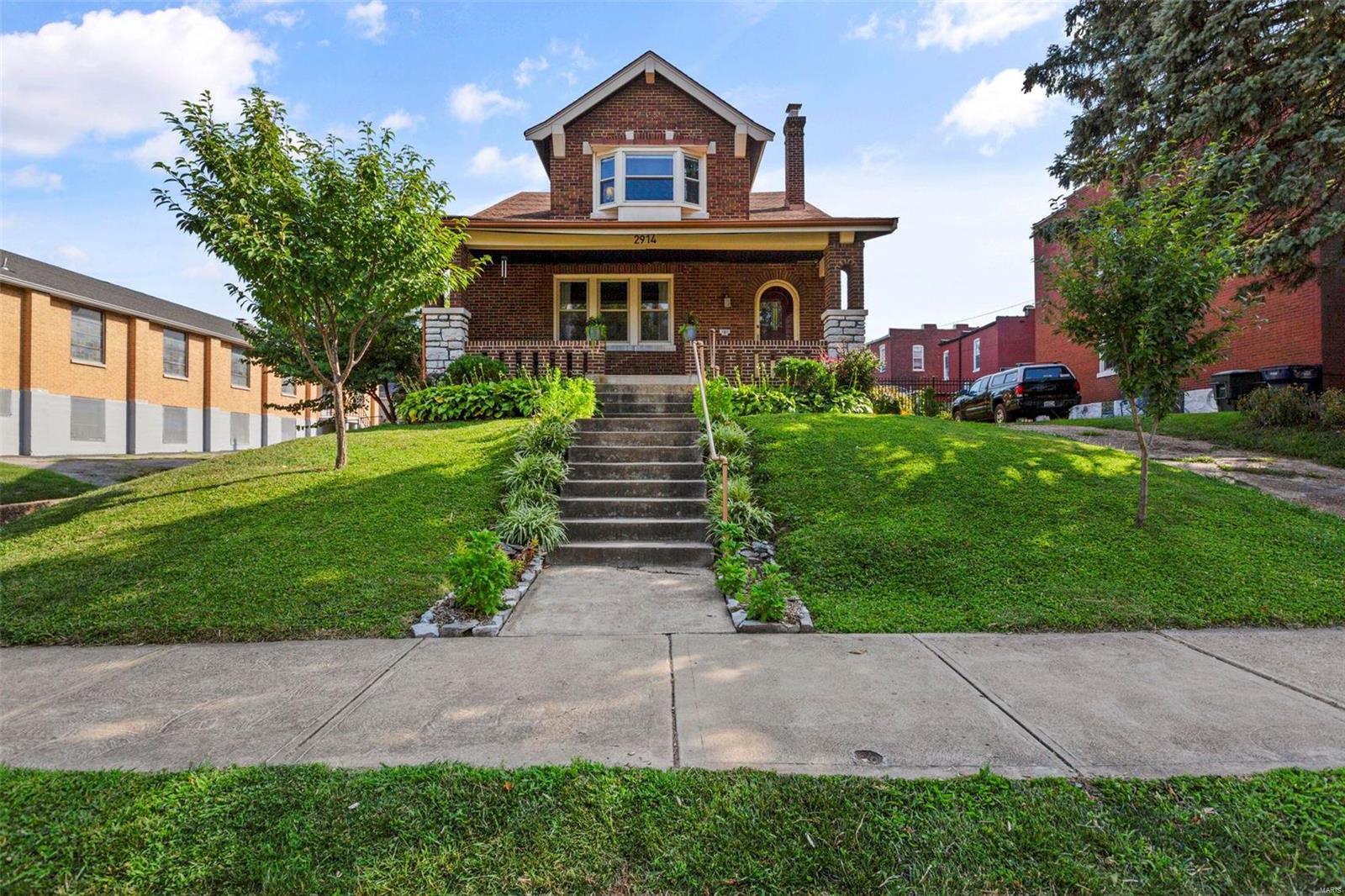 If you love entertaining, we've got the house for you! Step off the street right on to the inviting and roomy front porch. Cozy living room & private dining area that includes built in dry bar. Custom millwork thru entire home. The kitchen boasts of craftsman cabinets, walk-in pantry & the most perfect island for entertaining & gathering. Sitting room off the kitchen makes for a cozy reading/hang out area. Down bedroom/guest room/WFH space included on the main. Upstairs the expansive primary suite has 2 spacious closets and a relaxing full bath. 2 extra bedrooms, a bonus room & a full bath round out the second floor. Usable basement flex space w/ new water heater (2023). The spacious backyard is a dream come true - perfect for hosting dinner parties w/ the pergola and deck. Roof replaced (2021) on 3 bay garage w/ workspace room. A rare city find & so much more in this one of kind Tower Grove East home. Just walking distance from Fox Park, Little Fox, The Lucky Accomplice & more!
