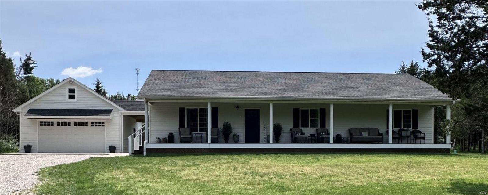 Coming Soon!!!  Beautiful ranch with Farmhouse design on 3.2 acres, built in 2018. Open floor plan with vaulted ceilings in open living room, kitchen and dining room area.  Covered front porch spans the entire front of home.  Detached garage with loft for storage. Covered poured concrete back patio with wood ceiling.  Beautiful flooring, cabinets, counters and center island.  Everything about this house is well maintained. Show by appointment only.