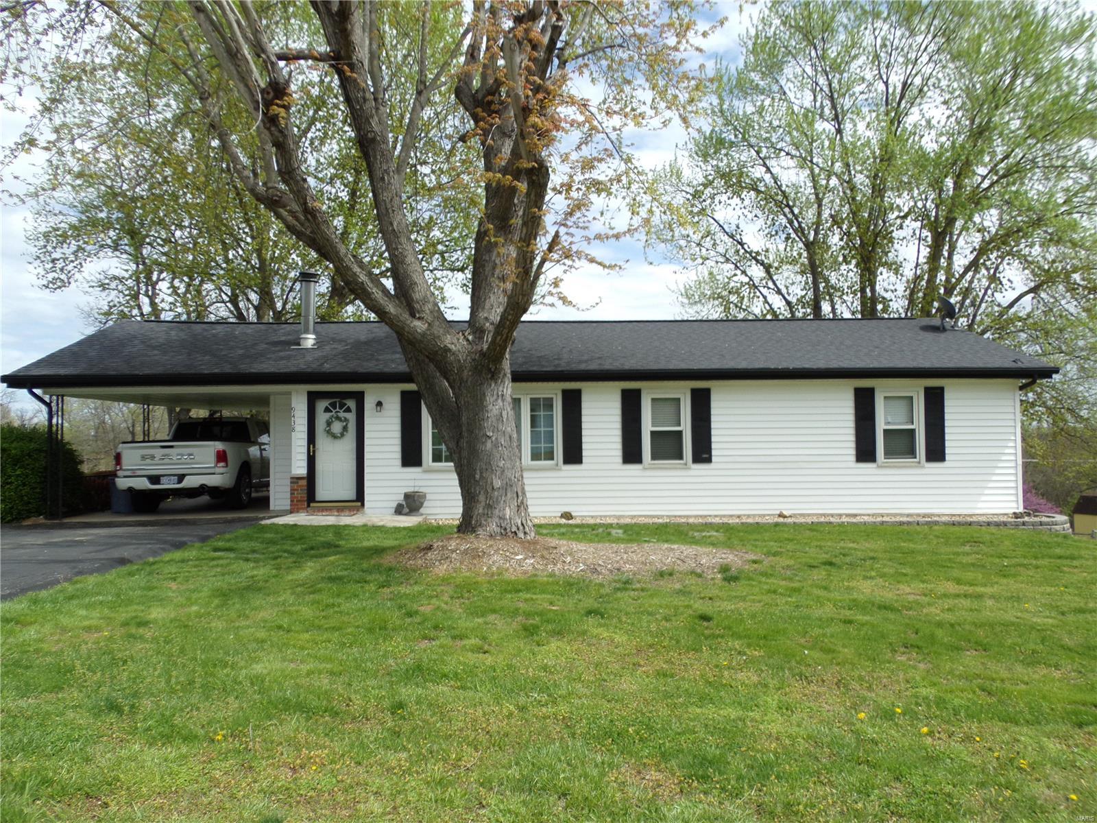This super cute well maintained ranch home is situated on a gorgeous .57 acre lot that backs to trees! Features include three bedrooms; Full bath; Living room w/a gorgeous wood burning fireplace; Kitchen/dining combo w/custom cabinets; A full basement w/walk out is just waiting for your finishing touches w/already a bath started,  and lots of storage, too;  Large patio is convenient for enjoying that wonderful back yard;  Large utility shed; Newer roof (5 yrs); And a one year home protection plan!  Don't miss this gem!