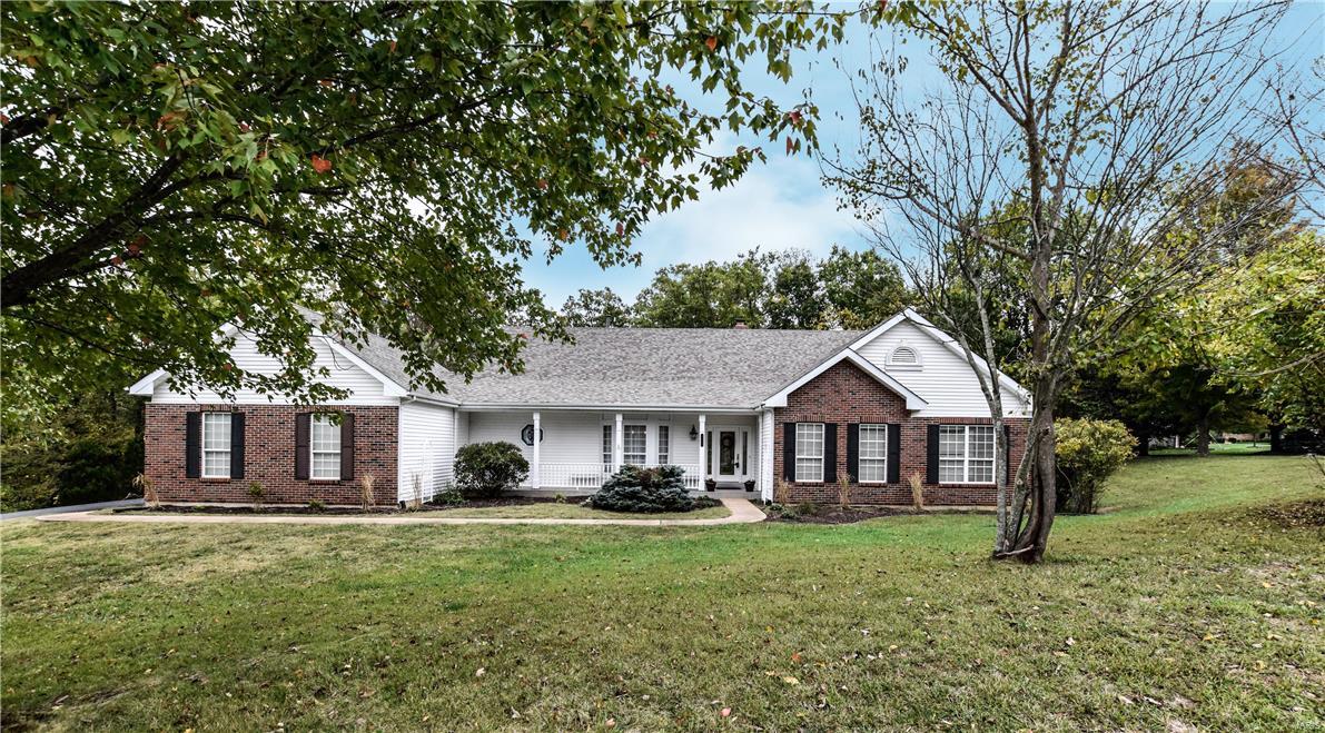 Gorgeous Great Room Ranch on 1+ AC, backs to woods. Job-Finished Wood floors grace the dining room, great room & hall. The floor to ceiling masonry woodburning fireplace is the focal point of the cozy great room. Soaring Atrium Windows Display Nature's Seasons and abundant wildlife.The kitchen has tile floor, custom oak cabinetry, center island with Thermador Gas Cooktop & planning desk.  The breakfast room opens to a large cedar deck. The formal dining room is the gathering place for large family dinners. The HUGE master bedroom suite features jetted tub, separate shower, tiled floor.The two bedrooms are oversized, utilizing space from 3 bedroom floorplan. The hall bath features tile floor & tub/shower.The lower level waiting for your finishes.OUTDOOR AREAs includes huge deck off the kitchen & aggregate private side patio. Sprinkler system. New Roof & Gutters 2017
AMAZING COMMUNITY WITH SUBD POOL & CABANA,TENNIS COURTS AND 100 AC of COMMON GROUND.GO TO WWW.RADCLIFFEPLACECOMMUNITY.COM