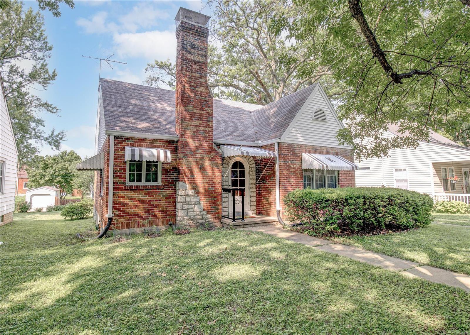 3 bed, 2.5 bath, 1 car detached garage Gingerbread House just 6 blocks from Main Street St. Charles! This home has so much character! From the original hardwood floors, doors, & converted gas fireplace, to the arched doorways & separate large dining room, this home is just adorable! Walking in you’ll notice the large living room with opening to the dining room off to the right. The kitchen is accessible from either the LR or DR & was remodeled with a main floor washer/dryer combo (hookups also in the basement). The main floor also boasts 1 full bath, 2 comparable bedrooms but the Master has two closets. Upstairs you will find the 3rd bedroom & 2nd full bath with plenty of space for add’l family room, plus 4 separate closets for storage. A little paint & some new flooring will transform this space! In the basement is the Rec room w/ newer vinyl plank floors, half bath, unfinished storage area & 2 separate work areas. This home is in the center of everything St Charles has to offer!
