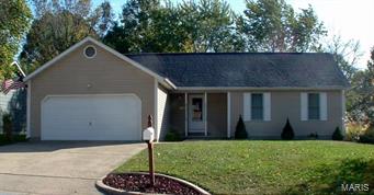 Really cute ranch home in a nice neighborhood.  Covered front porch, entry foyer with coat closet, living room with vaulted ceilings and windows overlooking the back yard.  Kitchen with great cabinet space, breakfast bar, dining has patio door that leads out onto the back deck.  The master bedroom has a private bath plus a big walk-in closet.  The other 2 bedrooms also have nice walk-in closets and a hall bath to share.  Utility room between the 2-car garage and the kitchen.  Pretty back yard with chain link fencing, huge deck with built-in seating and nice trees!  This is a great home, great location that's not too far from schools and shopping, ready to move into!