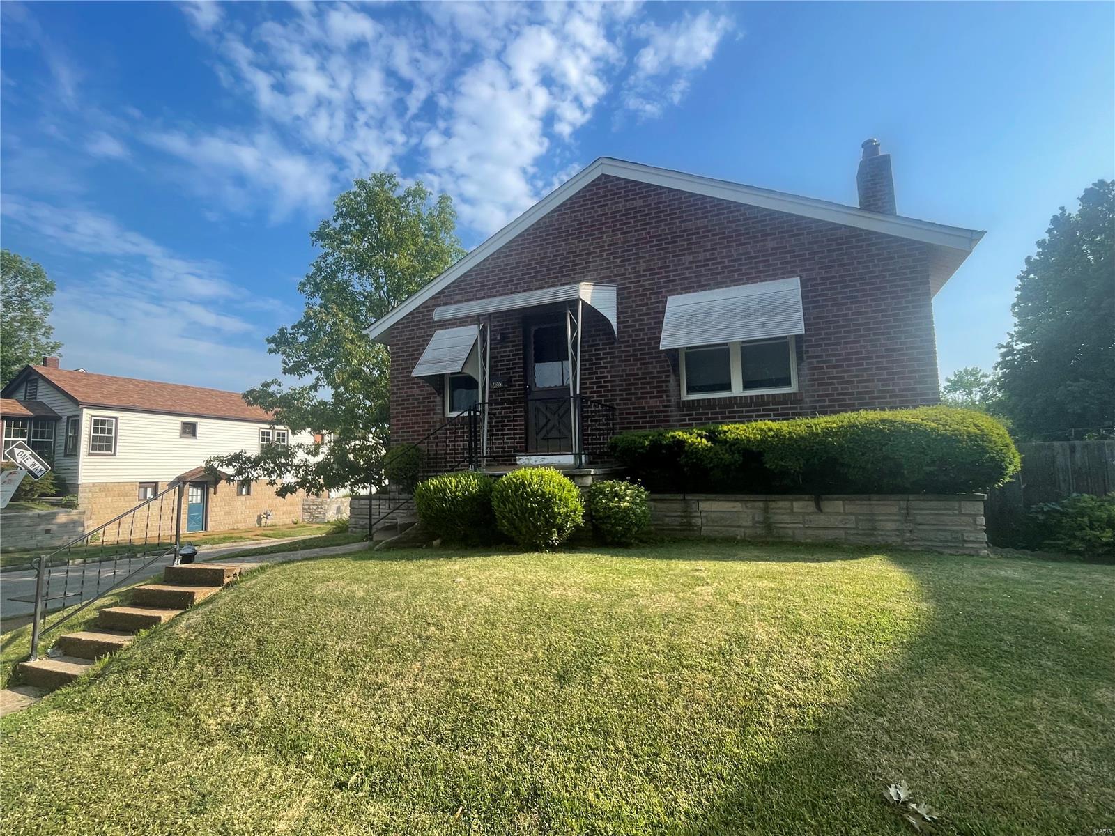 Great investment opportunity in the Bevo neighborhood! This 3 bedroom 2 bath home has over 2,000 square feet of living space with a finished basement and a wood-burning stone fireplace in the living room. The finished basement features a sleeping area, kitchenette, and separate entrance making it the perfect in-law quarters! The spacious backyard is great for entertaining. Perfect for an investor or a DIY project. Close to schools, parks, and restaurants.