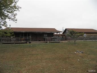 BRING THE HORSES, CATTLE, KIDS AND WHATEVER! THIS ONE IS "MOVE IN AND USE NOW" READY! On blacktop frontage, this property offers 20 acres m/l of beautiful pasture with home, barn and fencing setting back from road. Home updated and added on to in 2012 nearly doubling its size. 3 bedrooms and 2 baths with mostly wood floors and easy care, acid stained concrete with epoxy finish. Windows are thermopane, vinyl clad, tilt-to-clean and all but three were replaced in 2012. Updated kitchen includes new gas range and refrigerator in 2012, new dishwasher and microwave in 2015, granite counters, center island and breakfast bar. Home is zoned with two furnaces (one gas, one electric), two central air units and two water heaters plus outdoor wood furnace and wood stove in the living room. 40 ft by 30 ft m/l metal barn with four stalls and 40 x 20 m/l lean-to attached plus electric & water opens to paddocks & pastures with good fencing. Call about this dream come true! Mineral rights not included.