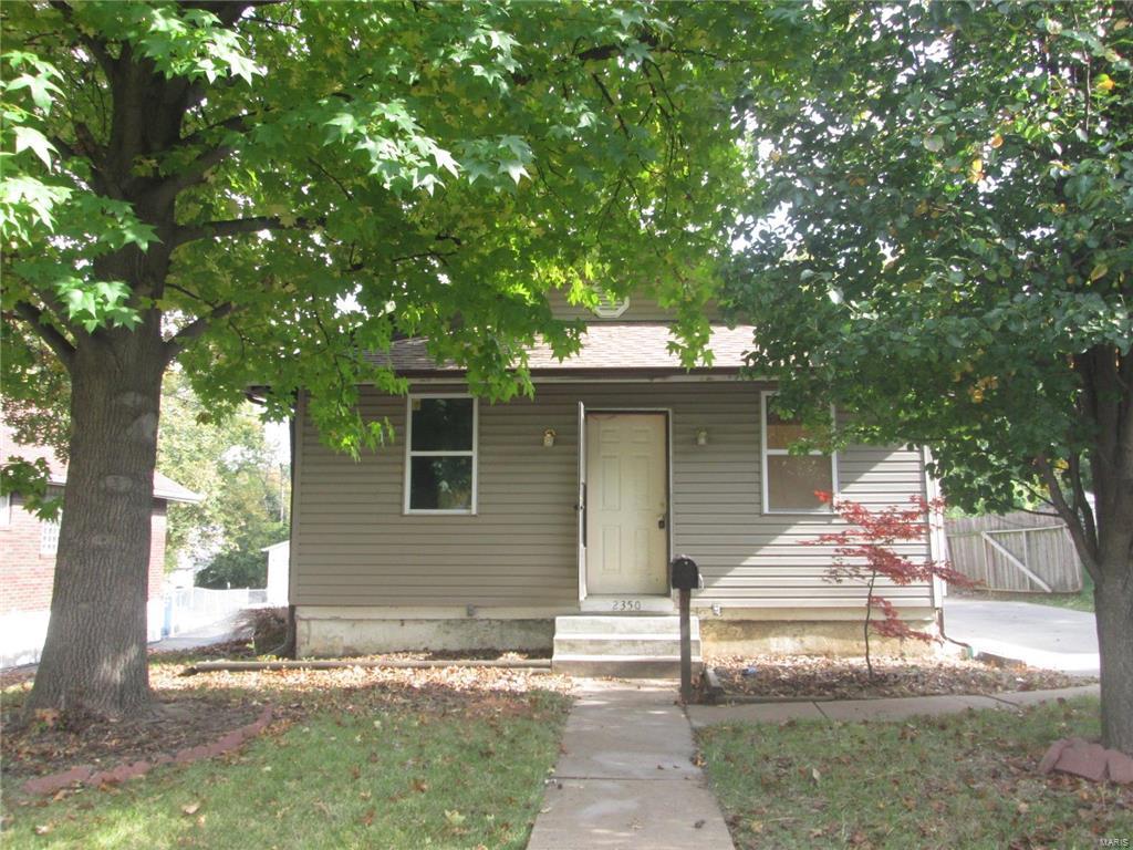 This is a snug little frame bungalow.   If you are looking for a starter home or maybe want to downsize, this is the house for you.  

There is wood flooring as you enter the home and a nice eat in kitchen.  Two nice sized bedrooms with ceiling fans and off street parking and a large fenced in back yard.

Wood deck off the back of the home is perfect for family and friend gatherings.  

Close to schools, churchs, shopping, public transportation, entertainment, restaurants and much more!

Stop by for a look and make your offer.
