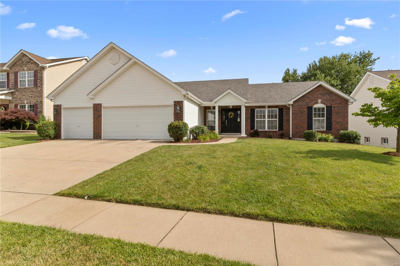 Must see darling ranch in sought after Villages of Bainbridge neighborhood!  As you pull up you will instantly notice the meticulously kept landscaping and exterior of this home. Come on in and take note of the open concept living area with vaulted ceilings and gleaming wood floors with gorgeous wood burning fireplace as Great room focal point! The Eat in kitchen with breakfast bar is perfect for entertaining along with large separate dining room for all your guests! Head back to the Master Suite where you will find a spa like tub with separate shower and large vanity with walk in closets. Two additional spacious rooms and main floor laundry complete the main level. The finished lower level is a dream with additional bedroom and full bath and large family/rec room with newly finished bar! Additional sleeping area/office and ample storage completes the lower level. Outside is fully fenced and large deck and patio for entertaining! This one will not last!