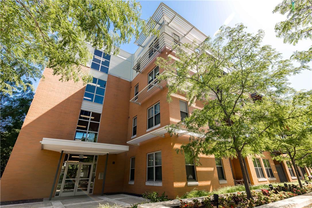 Carefree condo lifestyle awaits next owner. Summit Lofts is a ten year old two building complex of 52 units. Secure entry with both elevator and stair access to each floor. The unit has an open floorplan design with over 10 foot ceilings making it light and airy. The features include a dining and living room combination, large kitchen with abundant counters, cabinets and a breakfast bar. Large bathrooms and a 12 x 6 ft. custom designed master walk in closet. A laundry room inside unit and 9 X 7 closet in hallway outside unit. Enjoy private deck off living area and views of the courtyard from living area. All appliances remain including a refrigerator, and full size stackable washer and dryer. Two car spaces in building garage convey with property. Complex amenities include a heated outdoor pool, large clubhouse/party room, courtyard with outdoor grill. Condo fee covers trash and all utilities but electric at $425 per month.  AHS Shield Essential home warranty paid for thru 11/20/17. Some Accessible Features Location: Business Park, End Unit