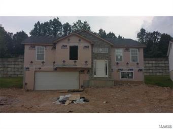 3 bed/ 3 bath Split level with vaulted ceilings, birch cabinets, crown molding, staggered stainless steel appliances. 
There is mian floor laundry, a master suite with separate shower and tub. There is a 14x12 finished room in the lower level. 
Oversized garage and a 10x20 patio