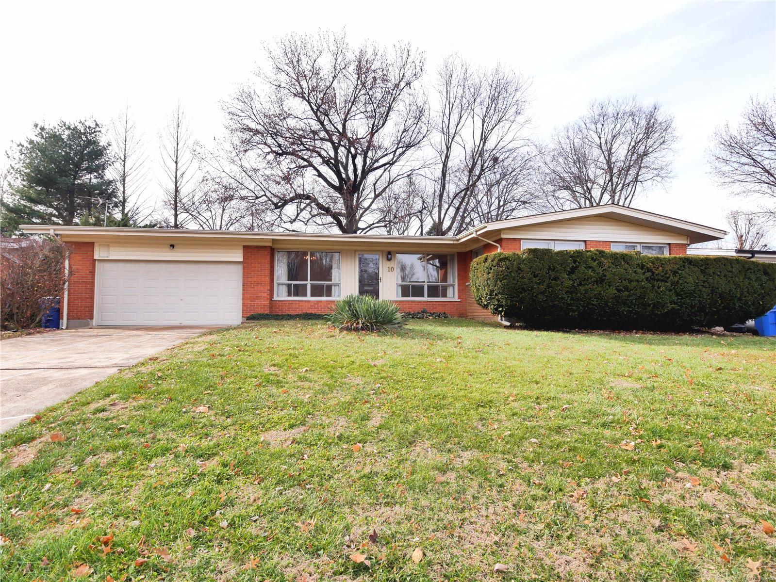 Sharp 3BR, 2BA Brick Ranch with 2 Car Attached Oversized Garage. Located within the city of Florissant and on a Cul-de-sac for low traffic. Attractive Hardwood Floors in the spacious Living/Dining Rm combination, both rooms with large windows overlooking your front yard. Sharp wood flooring also in Hall & 2 Bedrms. Living Rm leads to a separate Main Floor Family Rm which also has another large window looking out to your shaded, fenced yard. Plus there is a Recreation Rm located in the Partially Finished Lower Level. There's an extra commode in the Bsmt. The Eat-in Kitchen has an Electric Range, Disposal, Dishwshr, Built-in Microwave and the Frig stays! Mstr Bedrm has Full Bath with Shower Stall. Access to the 2 car garage right from your Kitchen. Marble Window Sills! Attic Fan. Covered Soffits. Beautiful neighborhood. Sidewalk in front of home. Enjoy use of the Florissant Recreation Center. We have already passed Florissant occupancy inspection. Less than a 5 minute drive to I-270.