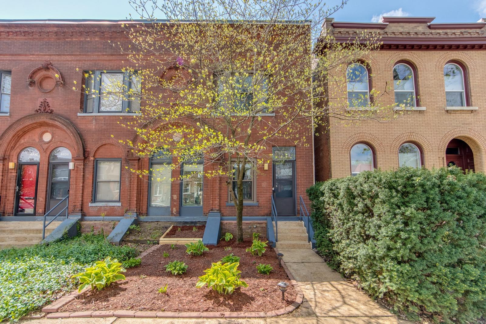 This fabulous townhouse nestled in the thriving and vibrant Grove neighborhood offers the perfect mix of contemporary styling and historic uniqueness with exposed brick, wood floors, stained glass, and high ceilings. Spacious and bright eat-in kitchen has ceramic floors, maple cabinets, granite counters, and stainless appliances. Step down into a stunning, sun-filled 2-story atrium; a great spot for a reading nook, office, playroom, or indoor garden. Off the atrium is a brick courtyard with privacy fence and a brand new two-car garage. En-suite bathroom has gorgeous, large walk-in tile shower while the luxurious full bath includes a jacuzzi tub. Finished lower level offers additional living space. Newer high efficiency HVAV/furnace. Recently replaced TPO roof, skylights, and recessed LED lighting. Perfectly situated within walking distance of BJH/WashU medical campus, Forest Park, and Grove restaurants and bars. Additional Rooms: Mud Room, Sun Room