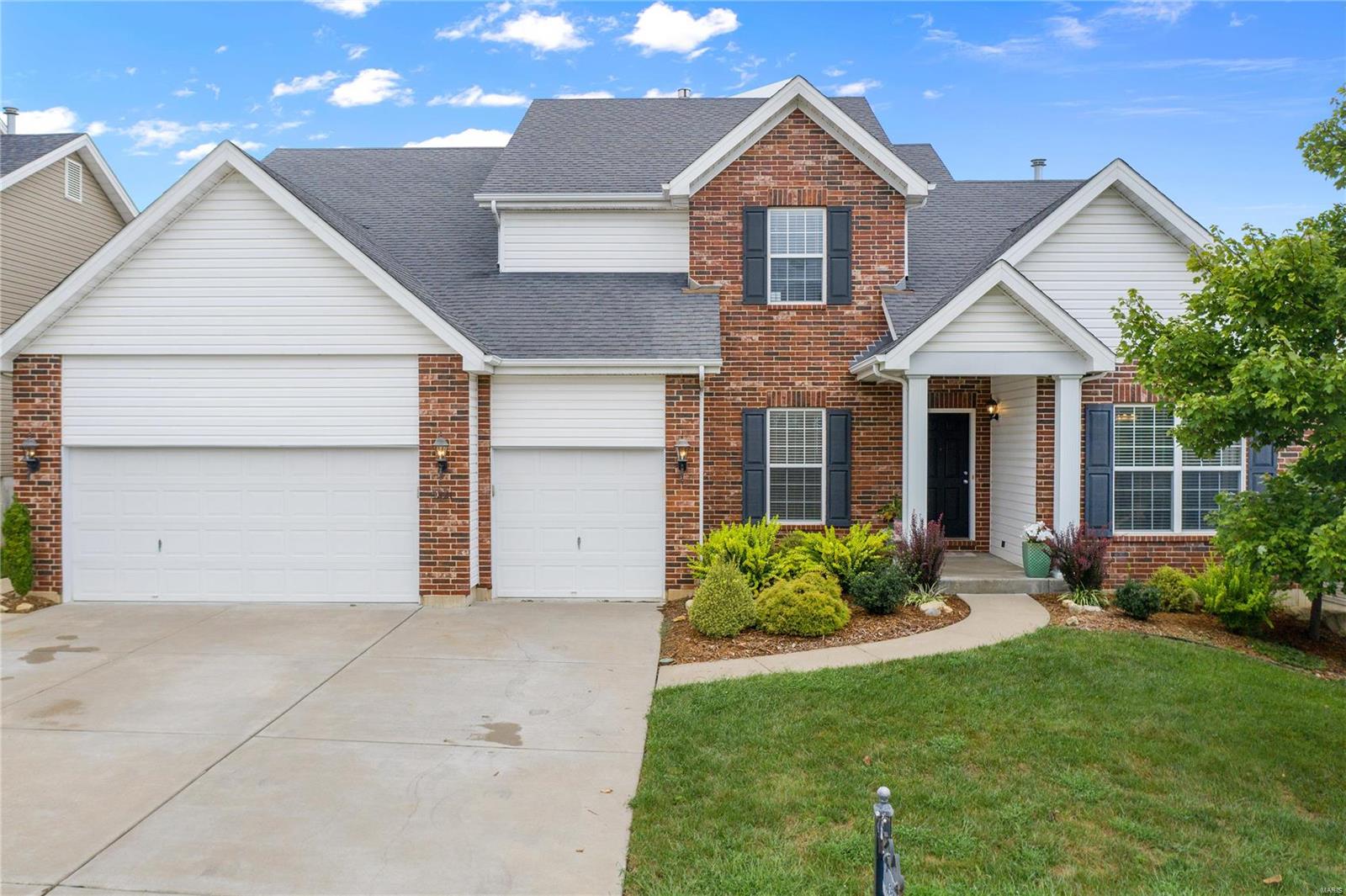**NEW PRICE!** 4 bed, 4.5 bath, nearly 4,500 sq ft! Gleaming hardwood entry w/2-story great room w/wall of windows! Kitchen ft. granite counters, newer SS appliances, 42" cabinetry, butler pantry & breakfast room w/bay window! Front office & formal dining, too! Spacious main floor master w/split vanities, sep. shower/soaking tub, & walk-in closet! MAIN FLOOR LAUNDRY outside master & half bath complete main level. Elegant rod-iron stairs head to 2nd bedroom w/private en suite & 2 add'l bedrooms adjoined w/HUGE jack & jill bath! Newly finished lower level w/spacious family/rec room, office, sleeping area, full bath & egress windows. 2nd washer hookup & ample storage! Fresh paint, too! Entertain outside in fenced yard on HUGE maintenance-free composite deck! Water softener ~2yo, water heater ~4 yo, 2nd floor AC ~1 yo, furnace heat exchangers ~1 yo. 1 year Choice Home Warranty provided! Original owners! Rockwood Schools! Community POOL & ball courts!