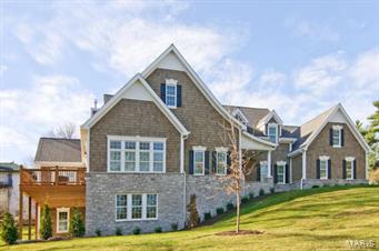 No Showings Until Saturday, May 9th. New Exclusive, elegant & spacious home on Private lane in the heart of Ladue. Unique lot evokes serene country feel. 5,600SF 5BR/5.5BA. Great home for entertaining! 1st floor: Great Rm, DR, study, kit., master suite, powder, laundry. Great room w/TV, stone gas FP, French doors lead to cedar deck. Center island eat-in kit., breakfast bar, ice mkr, bev coolr, Wolf/Sub-Zero Appliances, Cambria quartz counters, custom cabinets. High-end finishes thruout: tall ceilings, crown moulding, custom closets. Stunning mahogany entry door, open floor plan w/red oak floors fin. in place, French doors lead to study, dining room & from master to lg deck w/panoramic view. Mirrored master bath retreat w/heated floors, 2 head steam shower, Cambria quartz tops, lg walk-in closet. Upstairs: 3BR ea. w/en suite BA. Finished 1,600SF walk-out Lower level with bedroom, full Bath, family room, wet bar, 9.5' ceiling. Security system. Oversize 3-car garage. Addl parking area. Additional Rooms: Mud Room