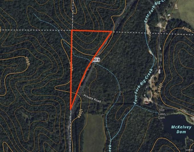 9+- wooded acres with Hwy frontage and electric available across the road. Public land and Castor River Access just a short drive away.