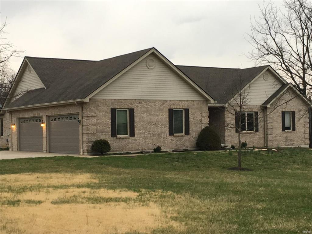 FULL BRICK RANCH HOME on 3 Acres in Summit Estates with 3,235 sq ft on the first floor. Imagine having a chef's dream kitchen with a large center island with downdraft cooktop, massive amounts of Granite Countertops and room for seating the largest of family gatherings all in the kitchen area, plus three large bedrooms that all have Private On-Suites, a 4-Car Garage 40x28 is insulated and has O/S doors. Anderson Windows and Doors, GEOTHERMAL HVAC and HE water heater, prvt septic and well make this so affordable on your pocket book you'll vacation more often with all the $ you save. The covered patio off the kitchen overlooks the heavily wooded 3 acres that is completely private in three-seasons, with a view of only one home in the wintertime. Central Vacuum & Main Floor Laundry. The lower level is unfinished & awaits your finishing touches with its Deep Pour Foundation & rough-in for a full bath which will offer you over 6,000 sq. ft. of living space.  Don't let this gem pass you by.