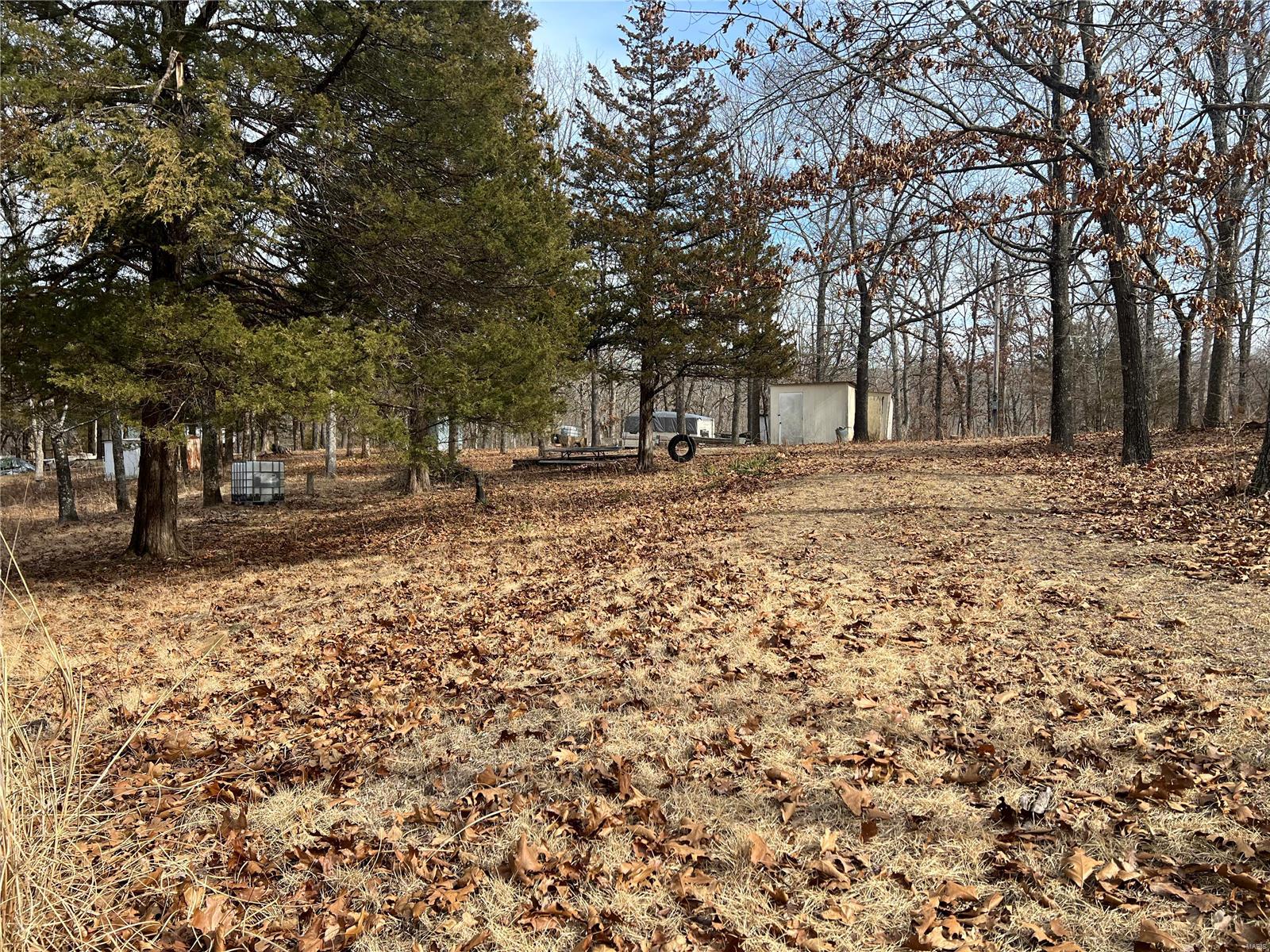 Enjoy the perks of Whispering Valley when you own this .41 ac double lot (Lot # 27 & Lot # 28).  Use the 3 stocked lakes for non-motorized boating, fishing & swimming.  Bring your camper or build a weekend cabin to use all year round.  This gated community could be your place for lakeside picnics & the relaxation you've been looking for. Call Today!