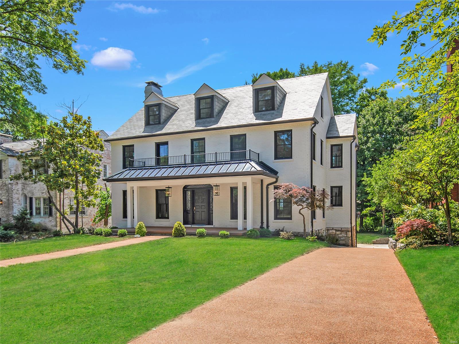 Stunning renovation in Clayton's Claverach Park, steps from Oak Knoll. This 4 bed/ 4.5 bath offers over 4400 ft of living space. Only subtle hints of the 1935 classic remain- a restored front door and hearth, terrazzo floor in the sitting room and beautifully refinished white oak flooring. With new systems throughout, Pella windows, covered front porch, kitchen, primary bath and back patio additions, this home has it all. Grand LR with recessed lighting, built-ins & wood-burning fireplace, separate DR with special millwork, handsome sitting room. Vaulted eat-in kitchen includes Thermador appliances, quartz countertops and custom cabinetry. Powder and laundry rooms complete 1st flr. 2 secondary en-suite beds lead to fabulous primary suite, complete w/ front balcony access & custom closet. 3rd fl offers a private retreat w/ another bed & full bath. Finished space in LL- perfect for gym/playroom/office. Oversized 2 car garage. Beautiful yard- ready for a pool! A must see!!