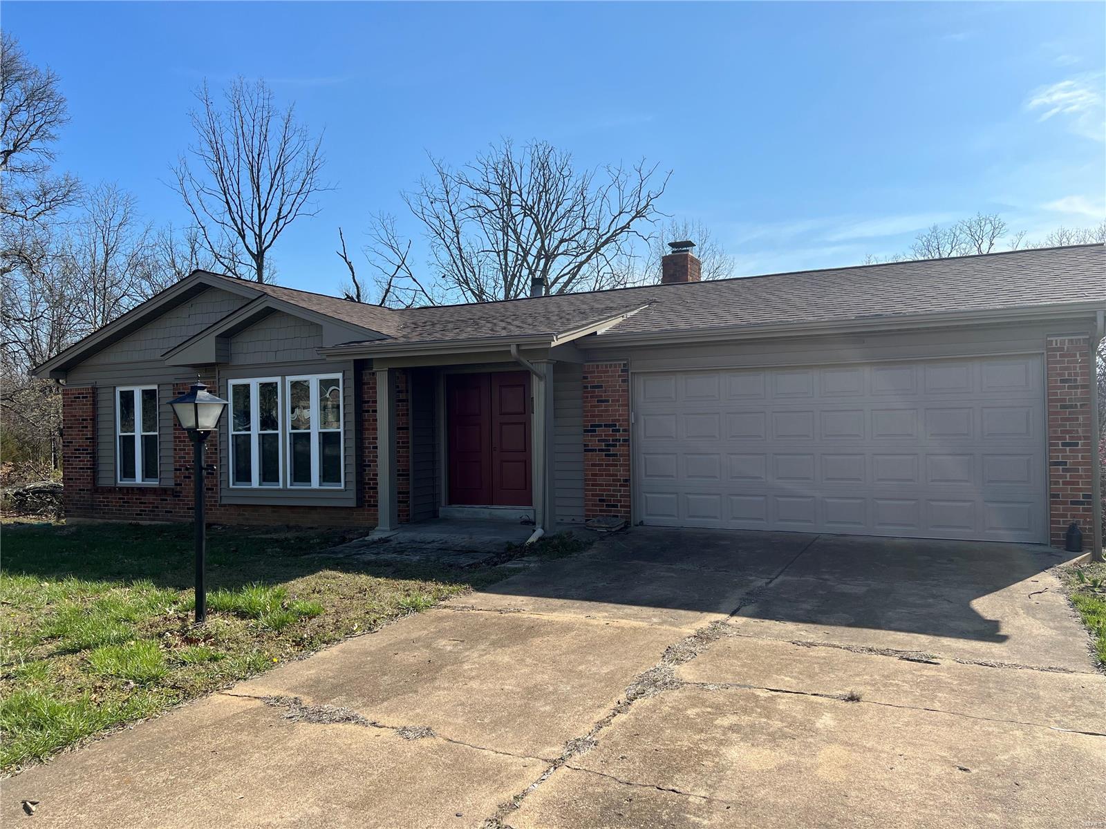 Looking for an easy project?! Here it is. This home has had the major things done to it and now it just needs your finishing touches! With 3 bedrooms, 2 bathrooms and a large unfinished walkout basement, this 1632 sq ft home sitting on almost 1 acre could be you everything you've been dreaming of. This home features a main level hearth room, a large sun room and a fenced in back yard. Call today to schedule a personal tour!