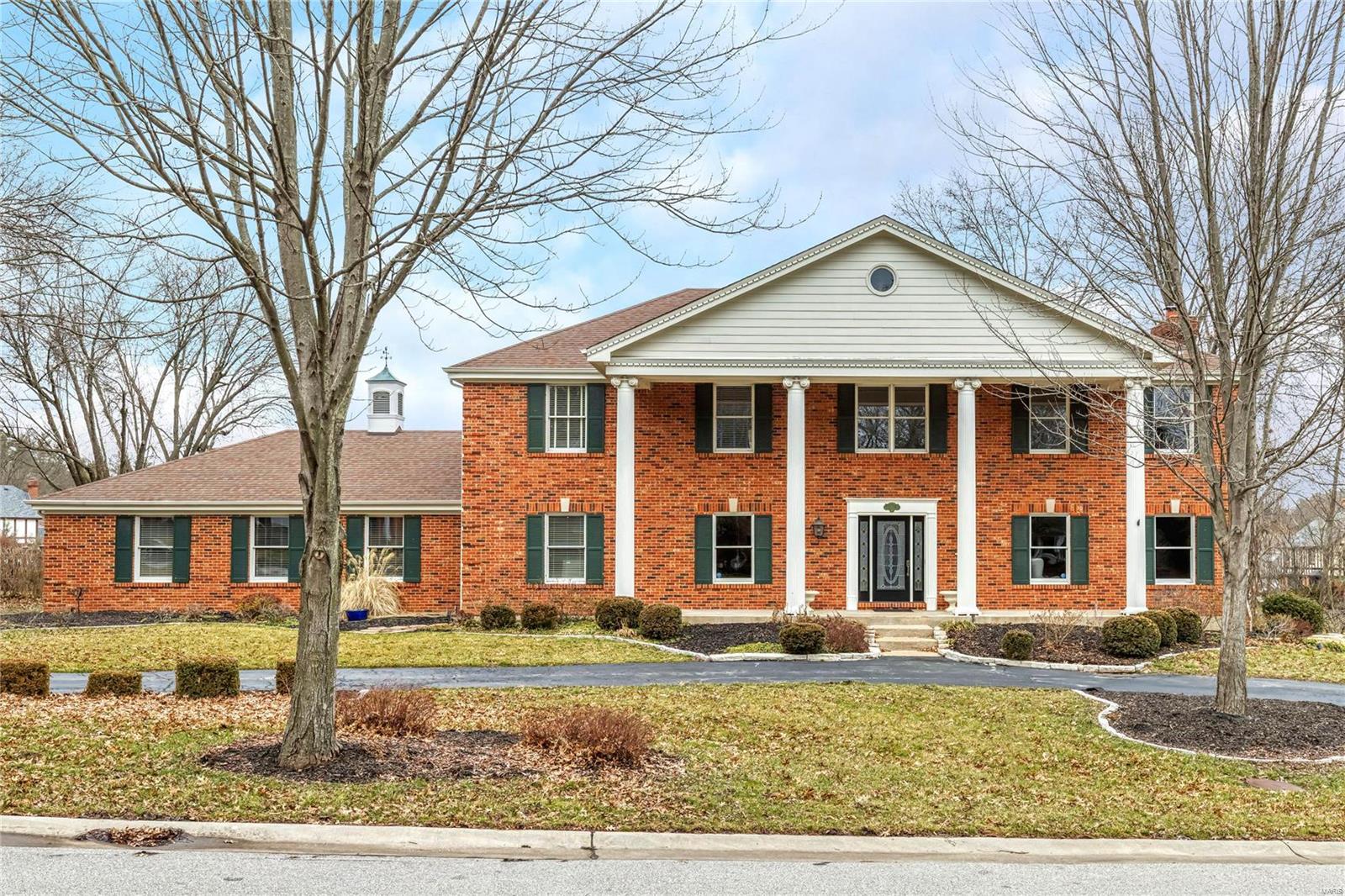 Classic 2-sty brick Colonial in beautiful Village on Conway! Exceptional craftsmanship & design elements throughout including extensive millwork, custom built-ins & Brazilian mahogany flooring. 2-Sty hardwood foyer leads to study with built-in bookcases & work center, elegant dining room and library-paneled family room with beamed ceiling, brick fireplace flanked by bookcases, wet bar & bay window with French doors that walk out to private deck. Chef’s kitchen featuring 42” white Shaker cabinetry, granite countertops, premium stainless steel appliances & center island adjoins light-filled breakfast room with convenient planning center. Spacious master bedroom suite with His & Hers walk-in closets & luxury bath with freestanding tub offers an appealing retreat. 3 Additional bedrooms & 2 hall full baths complete the 2nd floor living quarters. Lower Level entertainment space includes recreation room, game room & 1/2 bath. Situated on a .6-acre lot with deck, covered patio & 3-car garage.
