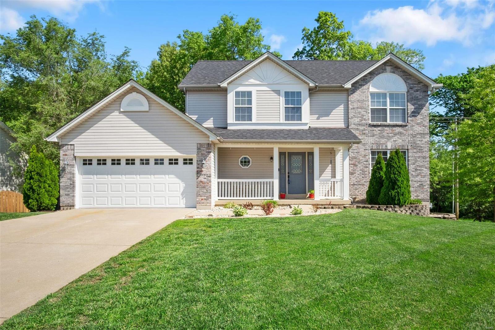 Beautifully updated 5 bedroom, 3.5 bath, 2 story home w/ mother-in-law quarters & over 3,000 sq.ft. of finished living space situated on a cul-de-sac. You will love the large composite deck, the privacy of the backyard w/ mature trees & the brand new architectural shingle roof. The kitchen features granite counter tops, contemporary back splash, stainless steel appliances & durable vinyl flooring all opening up to the living room w/ wood burning fireplace & beautiful built in bookshelves. The main floor is completed w/ formal dining room, family room w/ wainscoting & crown molding & laundry/mud room. Upstairs you will find 4 bedrooms, all w/ wood flooring & ceiling fans/lights. The master suite has vaulted ceilings & master bath w/ dual sinks, large tub & separate shower. The finished, walk out lower level features a 5th bedroom, full bath & kitchenette complete w/ gas cook top, refrigerator, updated ceramic tile flooring & large storage area. 1 year home warranty included. Additional Rooms: Mud Room