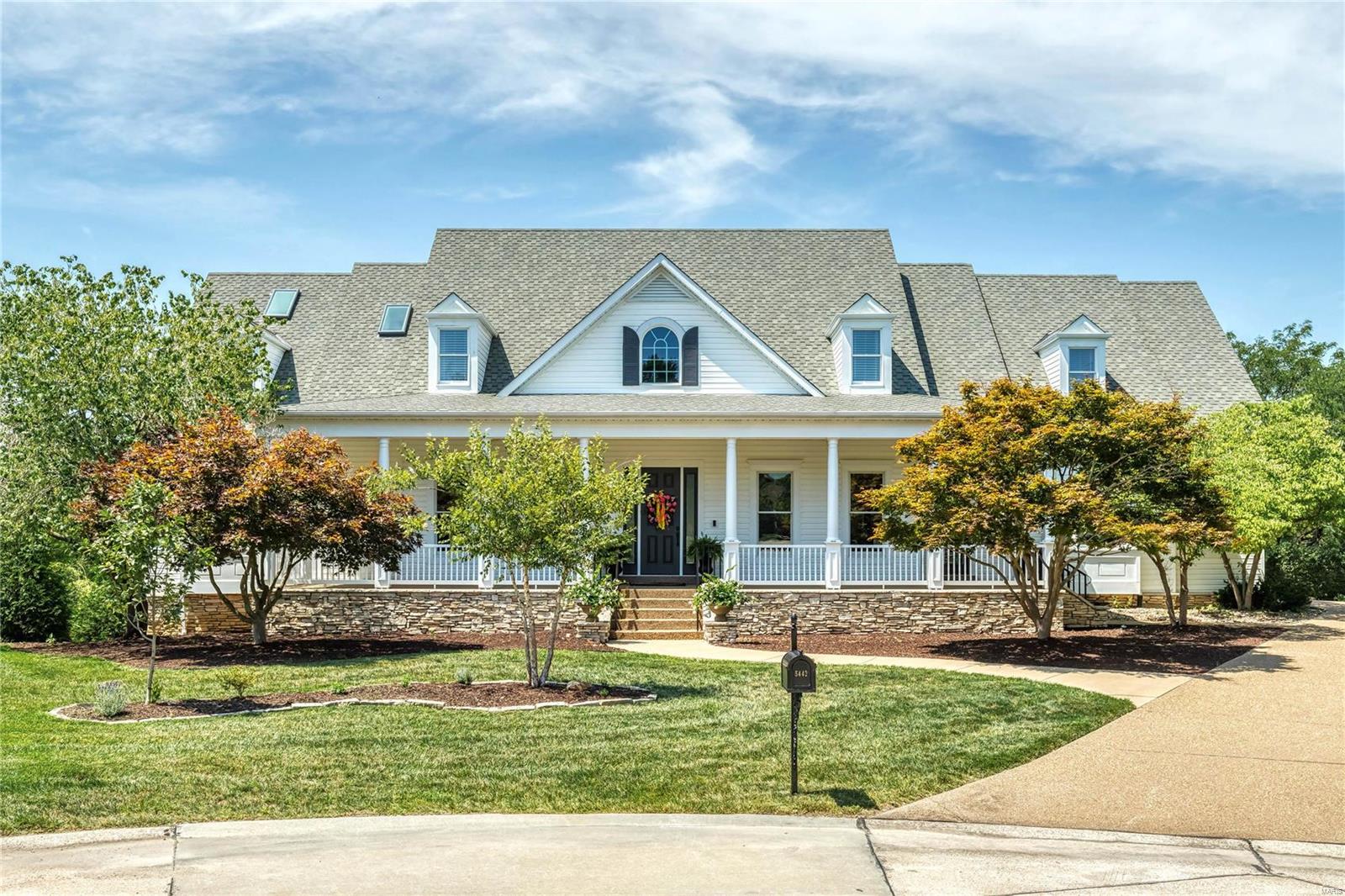Spectacular 1.5-sty Southern Colonial on 2.3-ac grounds. Homearama showhouse with over 7600 sf of living space enhanced by distinctive design elements, extensive updates & wide plank hardwood flooring that extends through the main floor. Impressive 2-sty foyer leads to study, elegant dining room & vaulted great room with floor-to-ceiling stone fireplace flanked by built-in bookcases & dramatic wall of windows. Designer kitchen with 42” buff cabinetry, granite countertops, commercial grade appliances & 7’ center island adjoins light-filled sunroom with beamed cathedral ceiling. Primary bedroom suite with fireplace & travertine bath offers an appealing retreat. Broad hardwood staircase accesses 3 additional bedrooms, 1 with ensuite bath & 2 with Jack n’ Jill, plus bonus room, workout room & 2nd laundry. Lower-Level features recreation room, gathering bar, wine cellar, guest suite & ½ bath. Outdoor living area includes pool, grilling station, pavilion with fireplace, hot tub & fire pit.