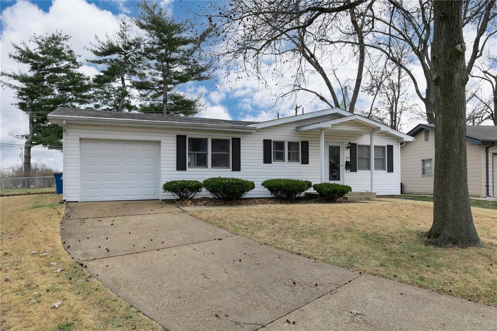 This charming 3 bedroom, 2 ½ Bath residence features gleaming hardwood floors , a large living room, a spacious kitchen adjoining a family room with sliding glass doors that lead to a patio and large level backyard.  A partially finished lower level includes a full bath and offers additional entertaining space.  Attached garage.  Ideally situated on this quiet lane.