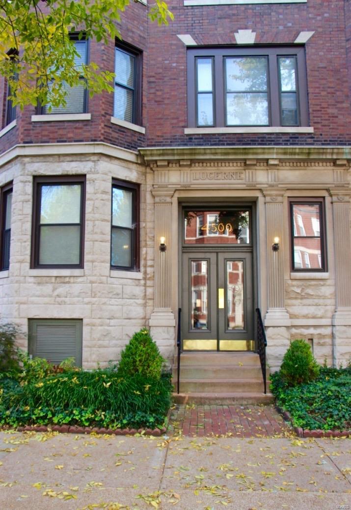 Available late-May/early-June. Outstanding, historic, top-level condo offers a uniquely brilliant swirl of modern comforts & architectural beauty: ornate millwork, crown molding, 9' ceilings, gated parking, & in-unit laundry. Natural light & foliage surrounding this corner unit create a private oasis. Master bedroom offers double closets, a sitting area, 4 windows, & gas fireplace. 2nd bedroom also has double closets & oversized bay window. Large livingroom has a 2nd gas fireplace, can lights, columns, & another bay window. Formal dining room can easily be used as an office or additional sleeping area. Granite countertops, under-mount lighting, newer appliances, pantry, & access to the rear balcony complete the updated kitchen. Blocks from Euclid, Forest Park, Wash U, SLU, Barnes, Metrolink, & tons of shops & restaurants. Agent-owner. $45 app fee/adult (18+). Must meet qualifications. Security deposit equal to 1 month of lease rate. Pets negotiable. Minimum 1yr lease. No smoking. Location: City, Corner Location, End Unit, Upper Level