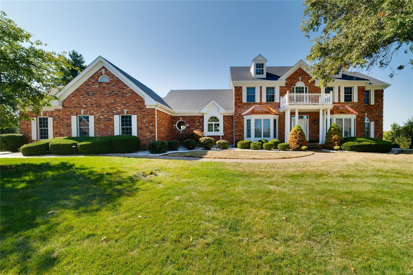 Classic, Stylish & Spectacular describe this custom built home in Prestigious Whitmoor Country Club. This Rare 1.5 Story Atrium has Astonishing Views of the Golf Course from everywhere on this Premium Lot, home includes over 5000 sq ft of Living Space, 5 Bedrooms, 5 Bath, Finished Lower Level, PLUS a Custom Gunite Pool! Welcome Friends into the 2 Story foyer with Custom Flooring Flanked by the Formal Dining Rm & Home Den/Office with custom shelving. Enter the 2 story Great Room with Gas Fireplace and a Wall of Atrium Windows, AMAZING! Don't Miss the Large Kitchen, Breakfast Rm and Hearth Room with Fireplace and access to the Deck. The Master Bedroom suite has a Private Deck & Remodeled Luxury Bath! The Second Floor has 3 Additional Bedrooms, 2 baths and Loft, Perfect for Kids/Guest. The Walkout LL is Finished with Full Wet Bar, Fireplace, Fitness Studio, Hot Tub, Additional Bedroom and Full Bath! Walk out on Pool Deck and Be Amazed. 3 Car Rear Entry Garage, Don't Miss this Home!