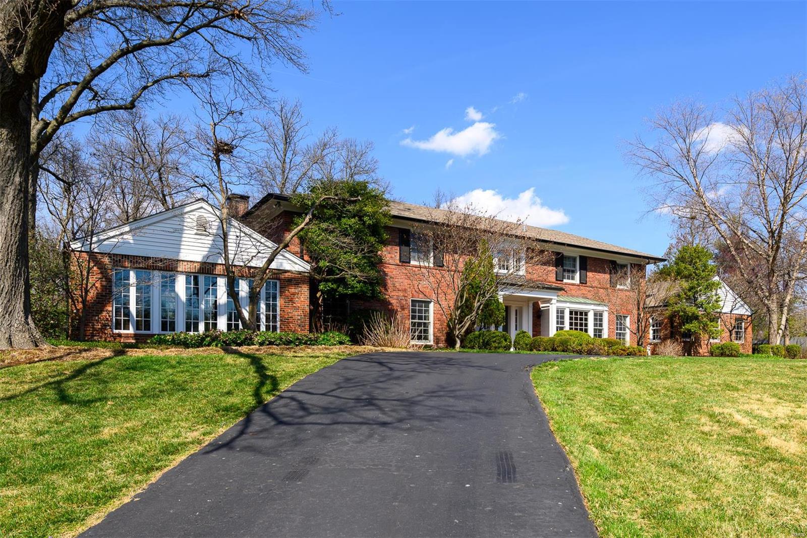 Nestled in the prestigious Fordyce neighborhood, this luxurious 2-story home exemplifies refined living. With 4b/5f-2hb, every detail of this residence exudes sophistication. The expansive floor plan seamlessly integrates gathering areas including a formal DR, a grand GR w/ walls of windows & custom built-ins, & a gourmet kitchen equipped w/ high-end appliances, abundant cabinetry, & stunning countertops. Just off the kitchen, a spacious HR opens to an outdoor entertainment area featuring a built-in BBQ & private pool. The effortless flow between indoor & outdoor spaces provides access to the pool & patios creating an ambiance for entertaining. Up are 4 generously sized ensuite bd w/ the primary suite featuring multiple closets for added convenience. The finished LL includes a rec room w/ built-in storage. Addl amenities include a MF laundry, wine cellar & a 3-car garage. On 1.8 acres w/in an award-winning school district, this home offers an unparalleled blend of elegance & comfort. Additional Rooms: Sun Room, Wine Cellar