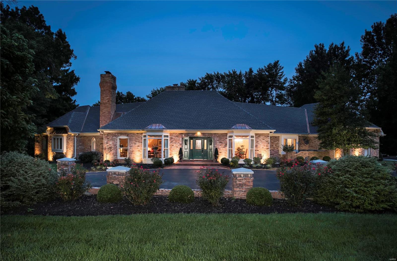 GREAT NEW PRICE! Set on a lush, private one-acre lot, this stunning 4 bedroom home has enjoyed frequent updates and is part of an estate. Certainly one of the best opportunities in Town and Country. Lovely mill work and floor to ceiling windows in the living room and dining room set an elegant tone. The striking paneled great room, with its two-story beamed ceiling and fireplace is the focal point of the home, while a well-designed addition houses the sunny family room, with enviable views of the yard, patio & pool. Spacious kitchen & breakfast room are updated, and the main level master suite is a peaceful oasis, with huge master bath, curb less shower and double sinks. A second main level bedroom & bath and two second floor en-suite bedrooms create a comfortable flow. The remarkable lower level is made for entertaining with walkout to the pool, large rec room, full bath, changing rooms & a sitting room/possible bedroom space. Three-car garage and main level laundry.