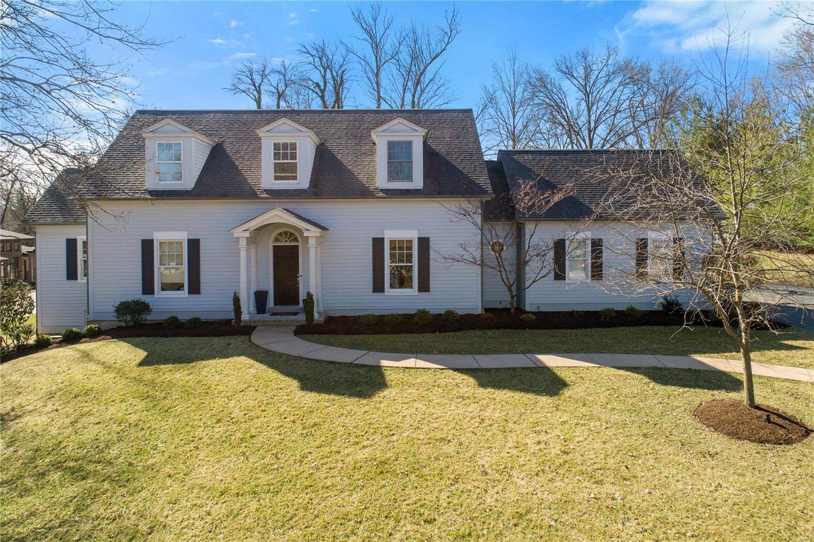 This unique & luxurious 1.5 story in a serene private setting will immediately captivate. Features include: Tall beamed ceilings, built in shelves, custom cabinetry, granite counters, stunning millwork, hard wood floors, & an abundance of natural light throughout. Custom cabinetry, wine cooler, top of the line appliances, & a large table style center island makes cooking & entertaining a breeze in this gourmet kitchen. Travel through the living room w/ the cozy fireplace to the sitting area with French doors that lead to a private patio. The main floor master suite features an oversized custom organized walk-in closet while the spa like bathroom includes a jacuzzi tub, separate shower with dual heads, & his and her vanities. 2 bedroom suites complete the upper level. Continued Entertainment is highlighted w/ the finished LL which boasts 2 additional bedrooms, full bath with steam shower, fitness room, & rec room w/ wet bar. The indoor & outdoor features of this stunning home abound!!!