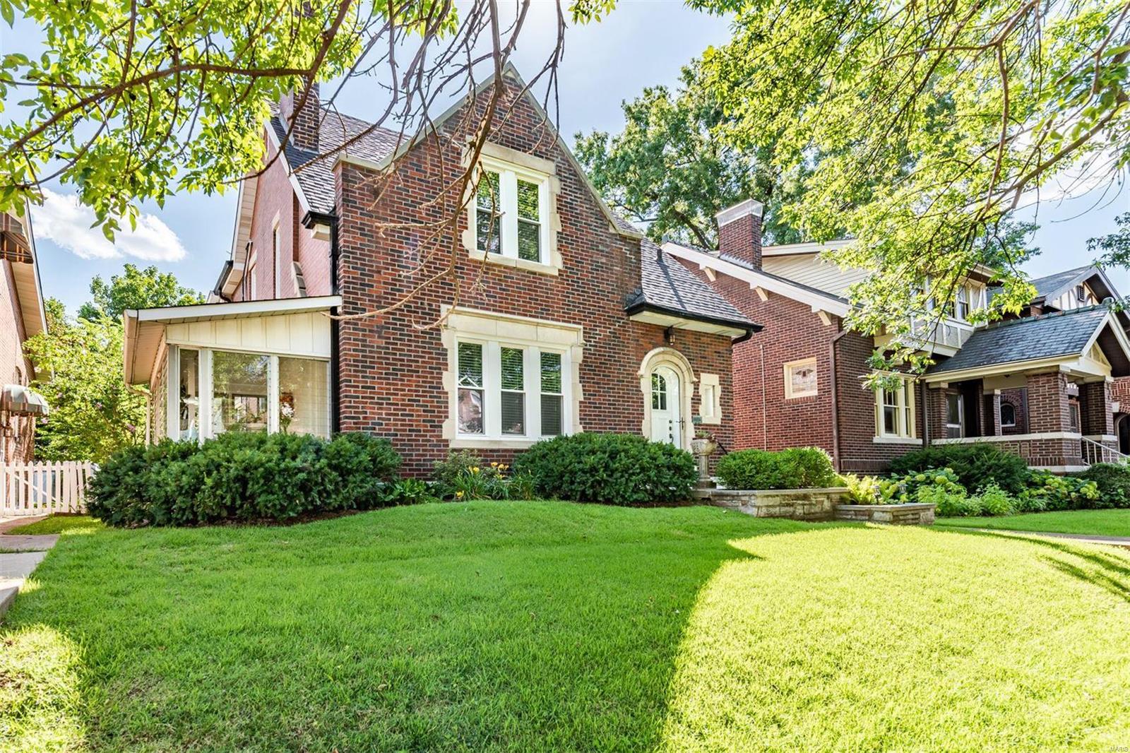 North of Carondelet Park you’ll find a testament to lasting masonry, millwork, community, & craftsmanship. Standing steadfast since the 1920s in the verdant & neighborly stretch of Holly Hills, this timeless home rests among mature shingle & water oaks providing shade to the well-manicured yards & homes. From the curved oak front door flanked by sturdy architectural cornerstones, one can walk to the park at Bellerive median, Poetry Pop, or movies on the Pkwy. Find solace by the hand-hewn sandstone fireplace & warm oak floors. Stretch out in the den, or with a book in the soft light of the sunroom. The kitchen comes well-appointed with ample space & wet bar. Host gatherings on the rear patio and garage area among a well-manicured floral landscape. When it is time to retire, the spacious upper bedrooms and walk-in closet welcome you to a carefree and restful night of sleep. The original marble paneled bathroom completes the upper level showcasing the enduring appeal of this property. Additional Rooms: Sun Room