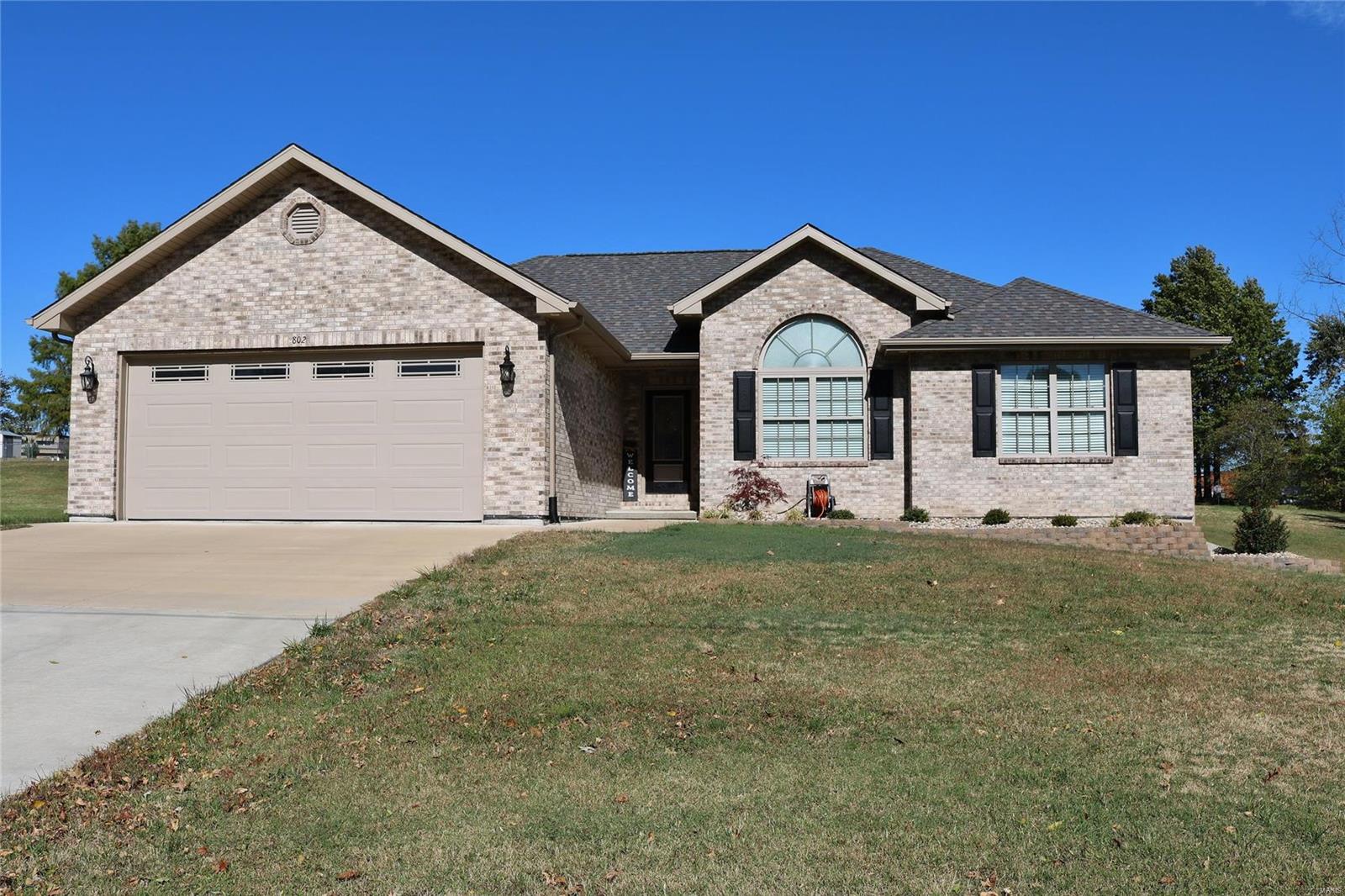 Built in 2016, this brick/vinyl ranch style home is move-in ready! The home offers 3 bedrooms and 3 full baths with 1569 sf on the main level. Walk in the door and you’ll be greeted with gorgeous hardwood floors, vaulted ceilings, an open staircase and open floor plan. The kitchen offers beautiful custom cabinetry, a breakfast bar and stainless appliances. An adjacent dining space offers patio doors leading out to a deck, great for enjoying your morning coffee. Just inside the 2 car attached garage is a spacious main level laundry with a wash basin. Enjoy a split bedroom floor plan also. The master suite offers a private bath with soaking tub and separate shower and walk-in closet. The partially finished walk-out basement offers a family room, guest room and full bath with plenty of room for storage as well. This home offers a great location too. Don’t miss out on this opportunity for a well-loved home!
