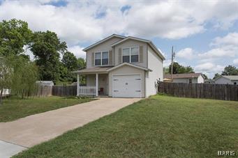 This adorable 2 story home is move in ready! 3 bedroom, 3 bath home is screaming your name! Located in a quiet cul-de-sac with fenced in backyard. The covered front porch greets you as you enter the home! The large family room has newer laminate wood flooring & opens to the kitchen that has plenty of counters and cabinet space. Master bedroom suite has a full bath and walk-in closet. 2 additional bedrooms and 2nd floor laundry are conveniently located upstairs. Low Maintenance Vinyl siding and 1 car over sized attached Garage. This is the perfect starter home for any growing family!!