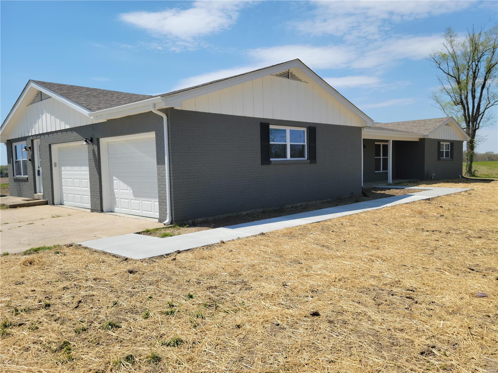 This is a 2300 sq ft fully renovated home. It sits on the out skirts of the quiet little town of Truxton. This home is basically a new home all the way down to new concrete in the garage, new windows, roof, HVAC, electric, plumbing, soffit/fascia, side walks/patio! Inside features a new kitchen, all new bathrooms, new bedrooms and the rest of the entire home! Although this home may not come with 10 acres. The views from the back yard of this home couldn't get anymore relaxing as you look over the hundreds of acres of farmland. It will make you feel like you are in the middle of nowhere. This home and these amazing views only about a 30 min drive to Wentzville. If the views are not enough maybe you could enjoy the family evening gathering around the large stone fireplace in the family room or cooking in the open concept kitchen. This home has a lot to offer. Come take a look today! Additional Rooms: Mud Room