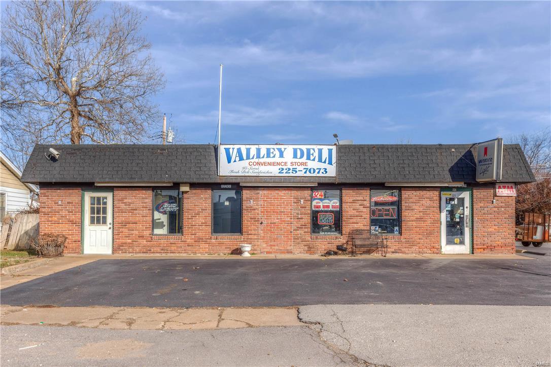 THERE ARE OTHER SEVERAL OTHER ADJACENT PROPERTIES THAT ARE FOR SALE IF BUYER IS INTERESTED IN INVESTMENTS OR NEEDS MORE LAND FOR OTHER PURPOSES.  OPPORTUNITY KNOCKS! DELI/CONVENIENCE STORE IS LOADED WITH EQUIPTMENT AND READY FOR PURCHASE. Building area could have many other future uses. Privately owned for approx. 20 years and ready to retire, the owners are leaving a large majority of all fixtures including, shelving, counter tops, & tables to dine. The kitchen has grills, fryer, steam table, ice maker & more! The main area has True 3 door coolers and freezers! Located on a busy street w/ample parking in the heart of Valley Park! Local Favorite!! Location: City, Corner Location, High Traffic, Industrial Area, Suburban