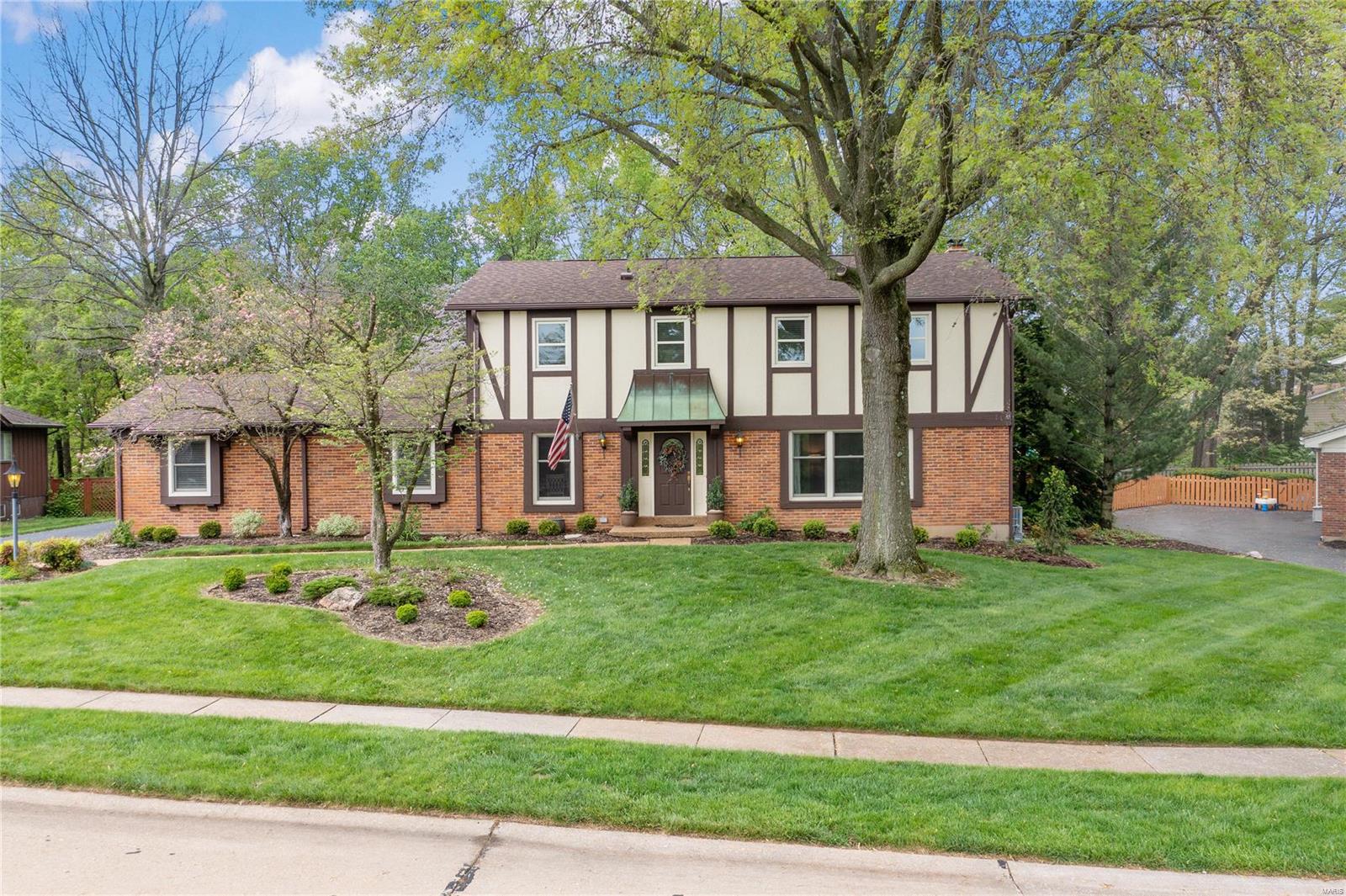 Exceptional 2 story w/ over 3200 sq ft , beautifully designed & offers impressive upgrades including gorgeous wood floors, crown molding throughout, Mullen cabinets & coffee bar in a newer kitchen w/ large center island, granite tops, backsplash & upgraded cabinets. Impressive entry foyer leads to a formal dining room & stunning great room w/ floor to ceiling fireplace. Upstairs offers 5 bedrooms & custom master bath. Lower level finish includes large rec room w/ granite bar for entertaining & full bath. Situated on a premium lot at the end of a cul de sac w/ a stone patio for entertaining. Roof was Replaced in 2016 & Zoned Heating & Air Conditioning