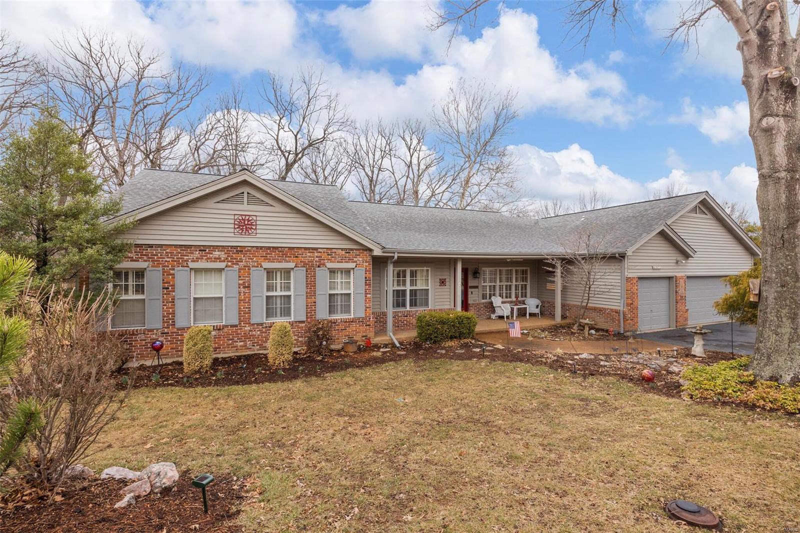 Spectacular ranch home on more than a half-acre lot in Winding Trails! This home has been meticulously cared for & well loved! The home opens to a large DR & den/office space w/wood floors & plantation shutters, leads to the generous sized vaulted family room, w/ fireplace, & wall of windows that look out to the wooded back yard. The kitchen has been recently updated w/ fabulous finishes; 42" custom cabinets, large island, 2 pantries, quartz counters & ss app & gas stovetop, opens to a NEW composite deck w/ a covered vaulted roof. The backyard is a tranquil setting w/ beautiful landscape & stocked pond. The main level primary bedroom is great size w/ ample closet space & ENSUITE BATH.  There are 2 add nice sized bedrooms & full bath.  Main level laundry & oversized 3-car garage. The finished walkout lower level has a spacious family room, full bath, bedroom with large closet, and huge storage room/workroom and new windows. Newer roof (6 yrs), NEW Lennox HVAC (2021). Rockwood Schools!