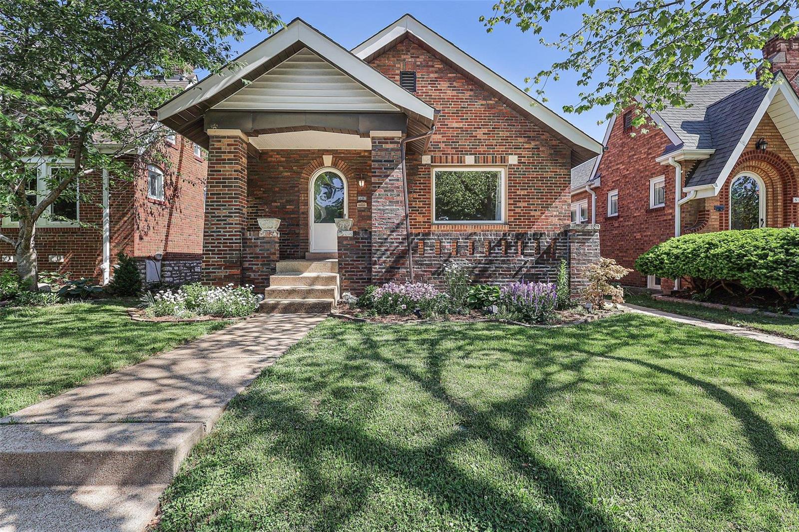 Showings start Friday May 20th at 3pm! Welcome Home to 5219 Tholozan Ave!! Home features a covered front porch, beautiful hardwood floors throughout. bright open living room, separate dining room and two large bedrooms. Step into the renovated kitchen featuring custom cabinets, solid surface counters, stainless steel appliances, and new lighting! Off the kitchen is a large deck, perfect for relaxing and entertaining! Bathroom has also been renovated. Fenced backyard, with patio and landscaping, and a detached one car garage. The walkout lower level is partially finished and offers a recreation area and plenty of space for additional storage. There is attic space for even more storage. Fantastic location, Parks, Restaurants and more!!