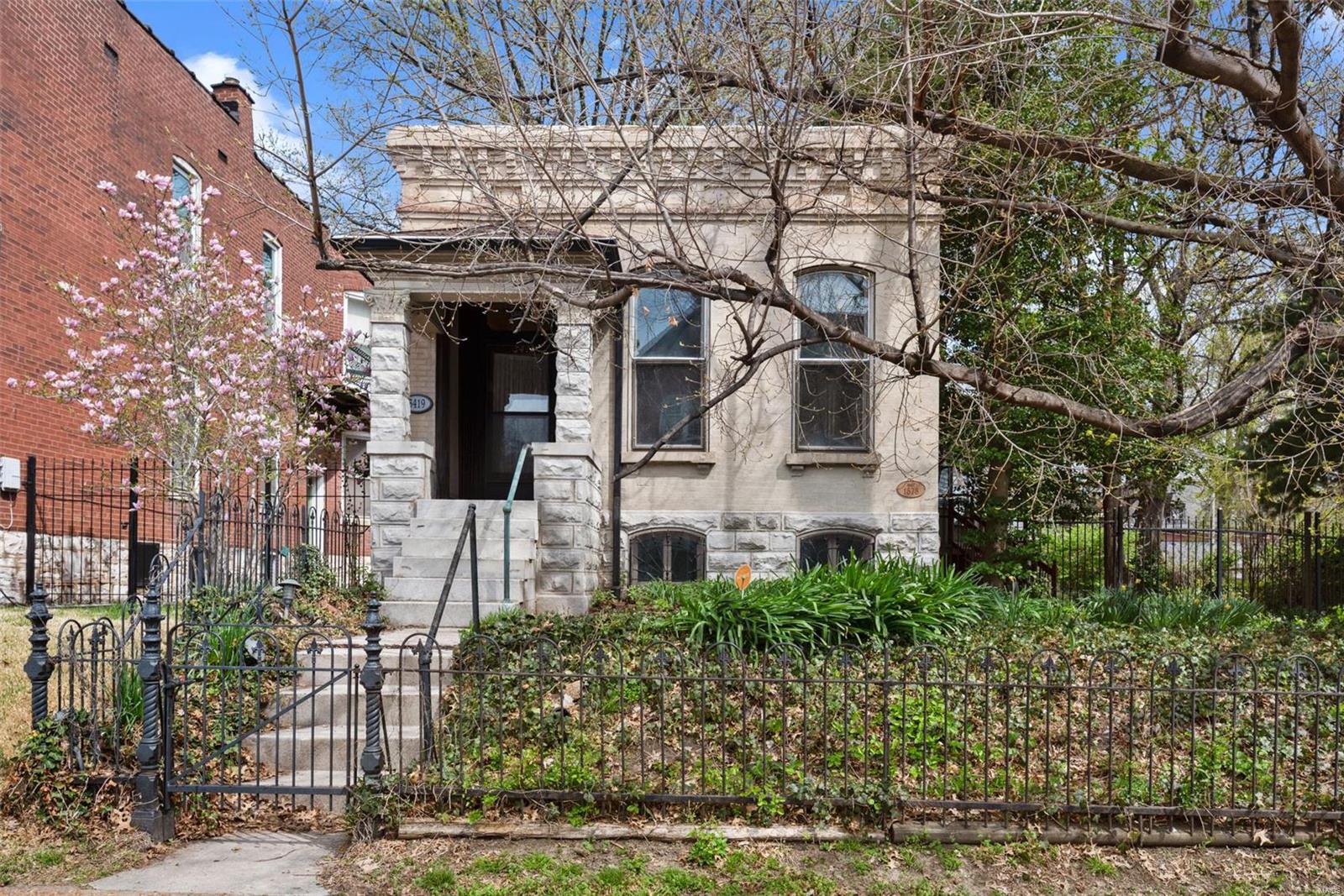 Calling all investors, rehabbers,  builders, city and historian lovers. Come and bring the life back into this post civil war Compton Heights beauty situated on a 75 foot front by 125 deep lot. And if you desire, with approval, build a new home next door. From the limestone steps to the original front door, 12 foot ceilings, 2 carved marble fireplaces, 2 crystal chandeliers and floor to ceiling windows makes this home so special. Eat in kitchen features a breakfast bar, induction heat range, stainless steel refrigerator plus a glassed in sun porch perfect for morning coffee. Walkout lower level offers a second full bath, sleeping area, and tiled hobby room. Brick garage, newer roof, 2020 high efficiency furnace and the most beautiful wrought iron front fence that historic lovers cannot deny. Be part of our thriving city and make her the belle of the ball again. Additional Rooms: Sun Room