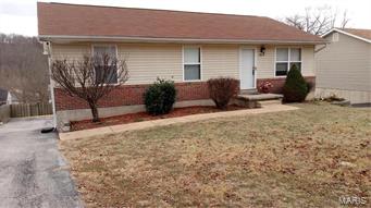 Great 13 year old  Ranch with so much to offer. Main floor laundry. 2 year old roof. Fenced yard. Oversized 2 car garage. Walk out basement has large family room with half bath and wet bar. Bring Offers!!! Just 10 minutes to Fenton. $1500 credit at closing for new carpet.